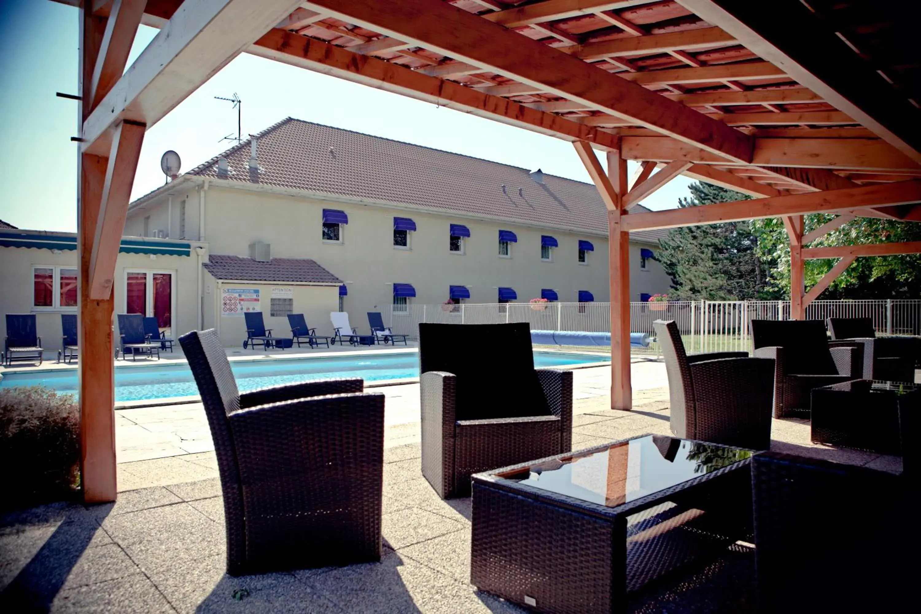 Swimming pool in Logis Carline Hôtel Restaurant