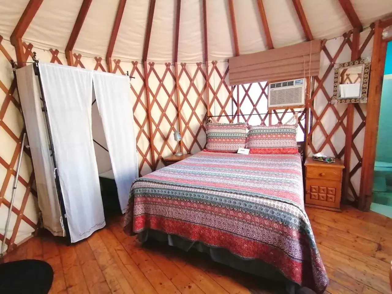 Bed in Sukasa Bungalows