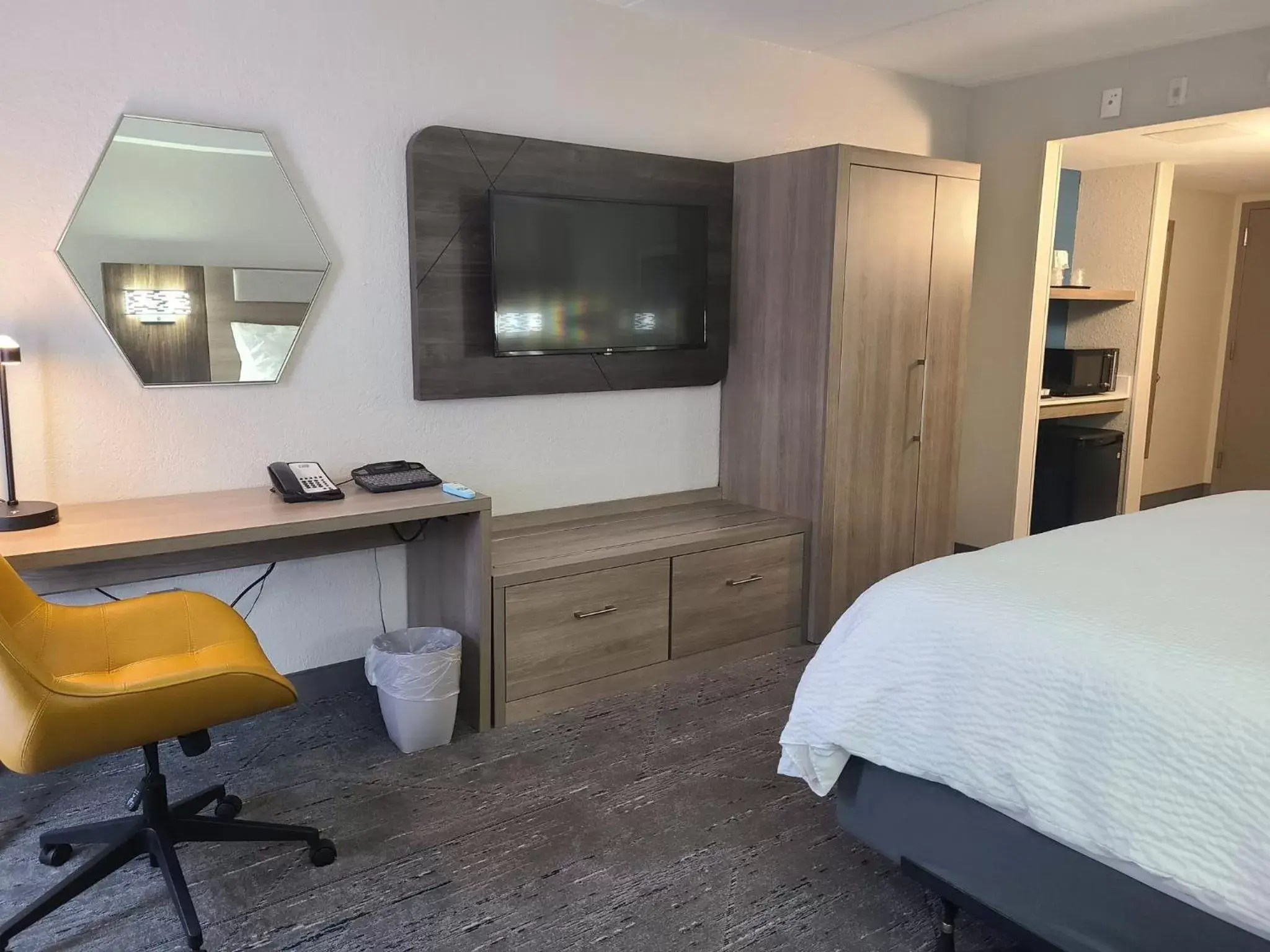 Photo of the whole room, TV/Entertainment Center in Holiday Inn Express Fort Lauderdale North - Executive Airport, an IHG Hotel
