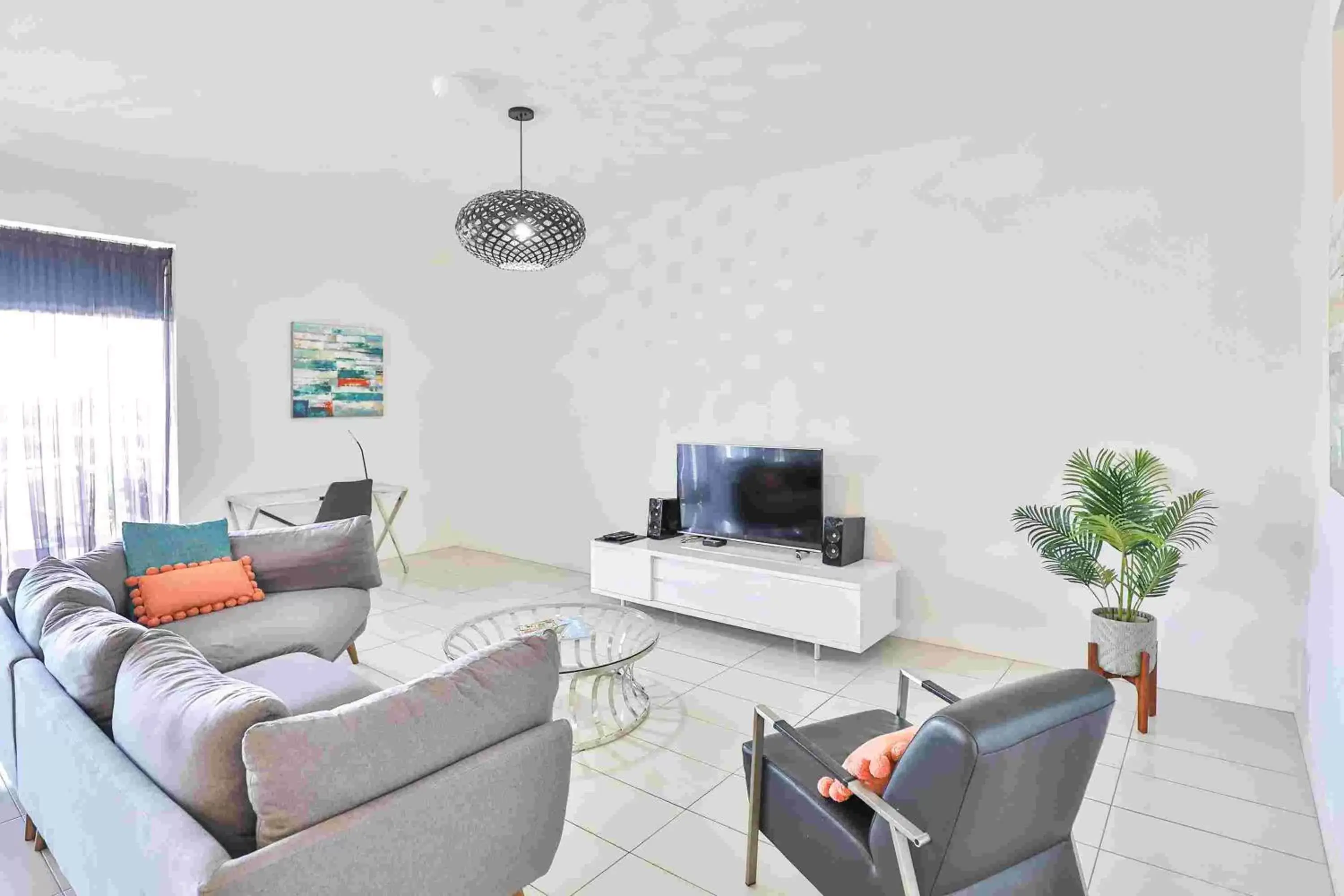TV and multimedia, Seating Area in Indulge Apartments - CBD