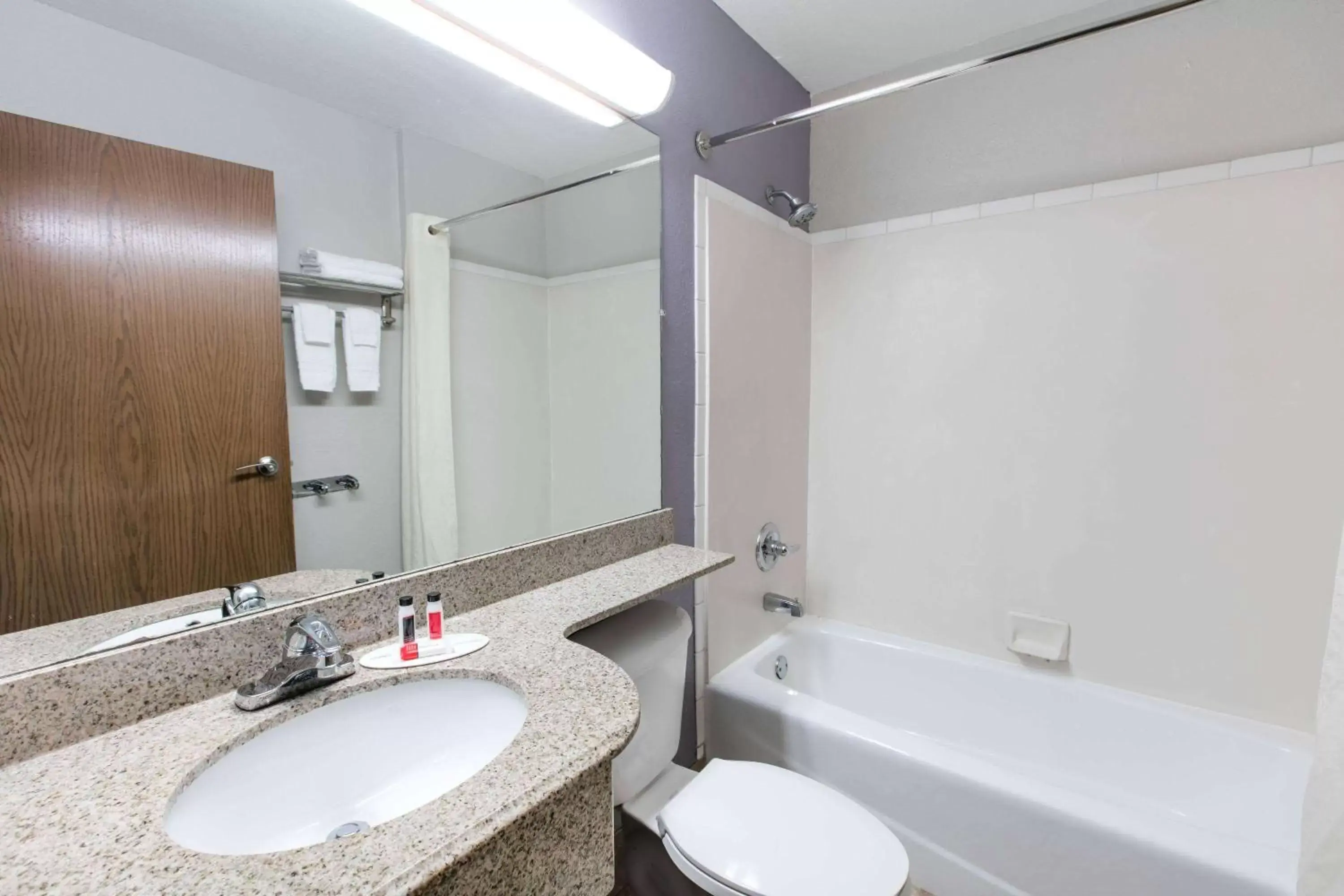 TV and multimedia, Bathroom in Microtel Inn & Suites by Wyndham Oklahoma City Airport