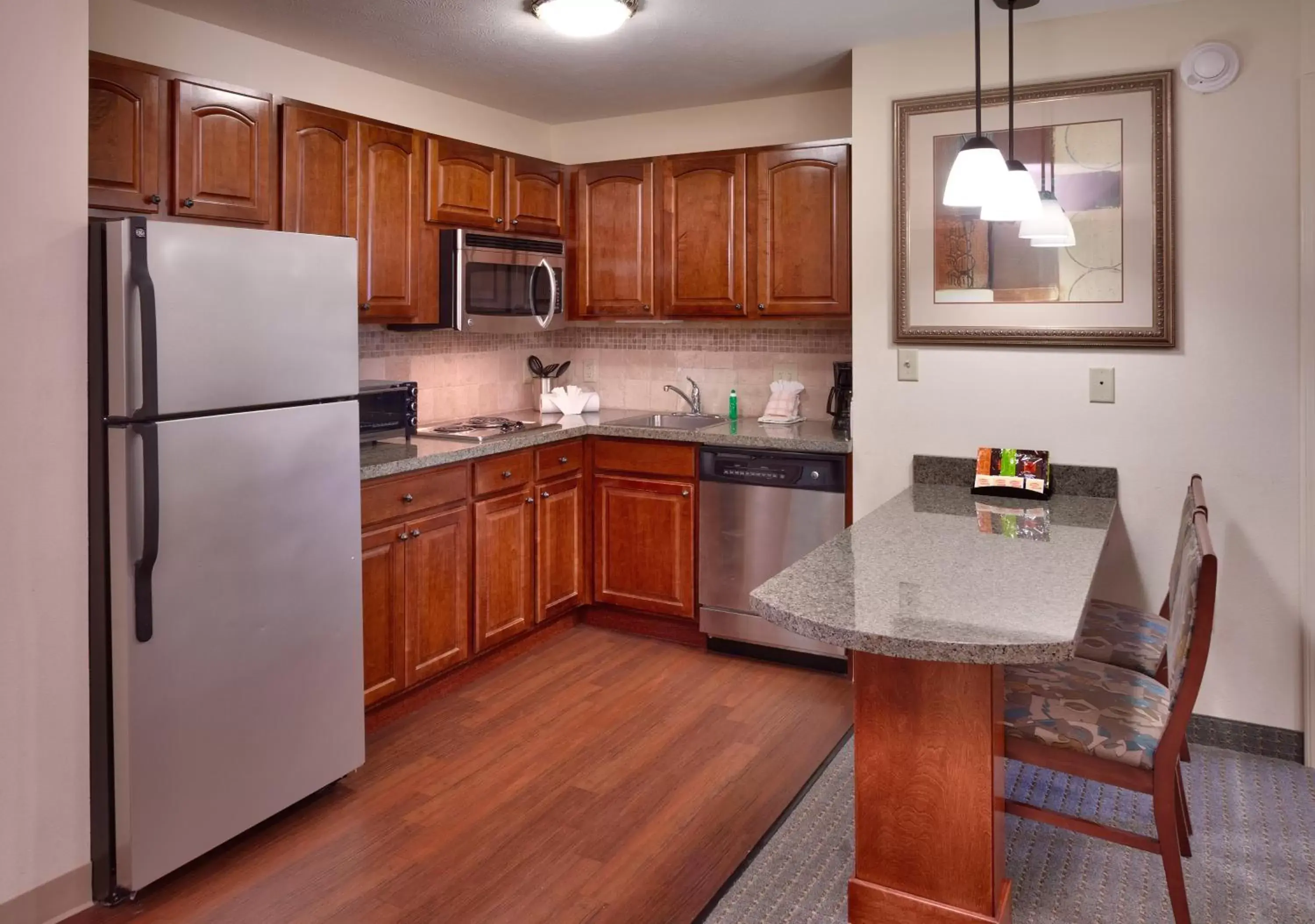 Photo of the whole room, Kitchen/Kitchenette in Staybridge Suites Omaha 80th and Dodge, an IHG Hotel