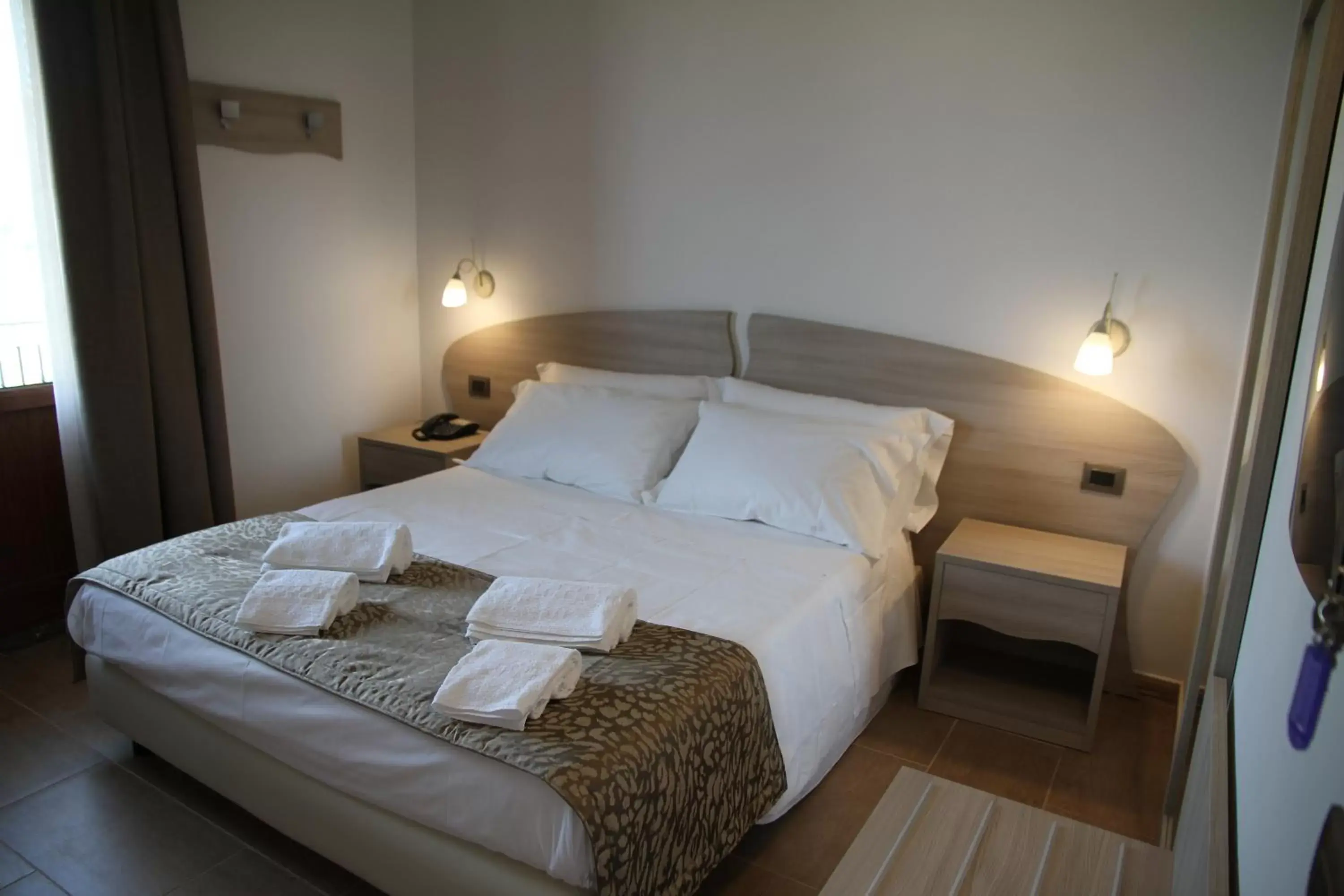 Bed in Monte San Giovanni-Nebrodi Rooms