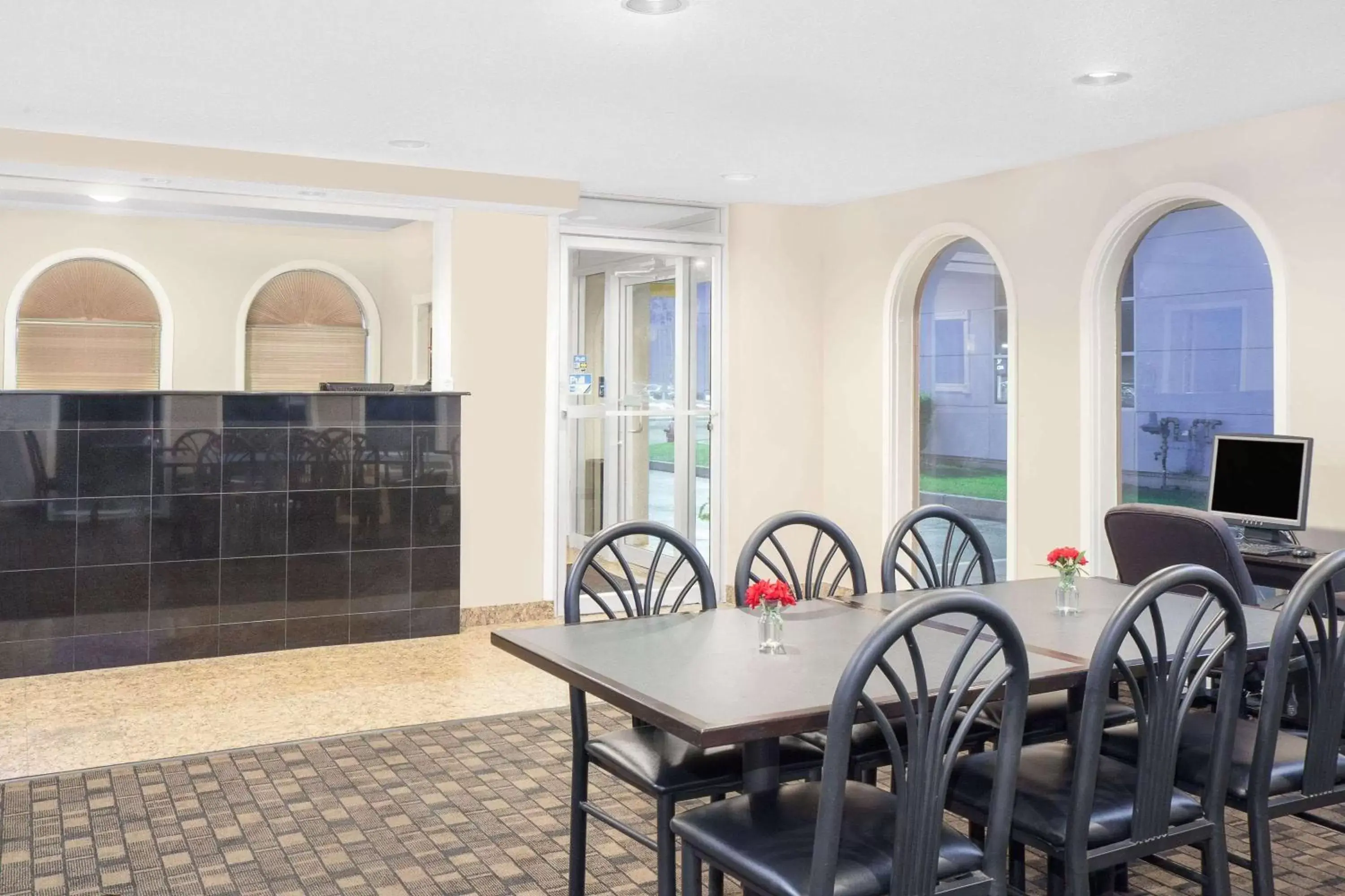 Lobby or reception in Super 8 by Wyndham Morton Grove/Chicago Lobby or reception in Super 8 by Wyndham Morton Grove/Chicago