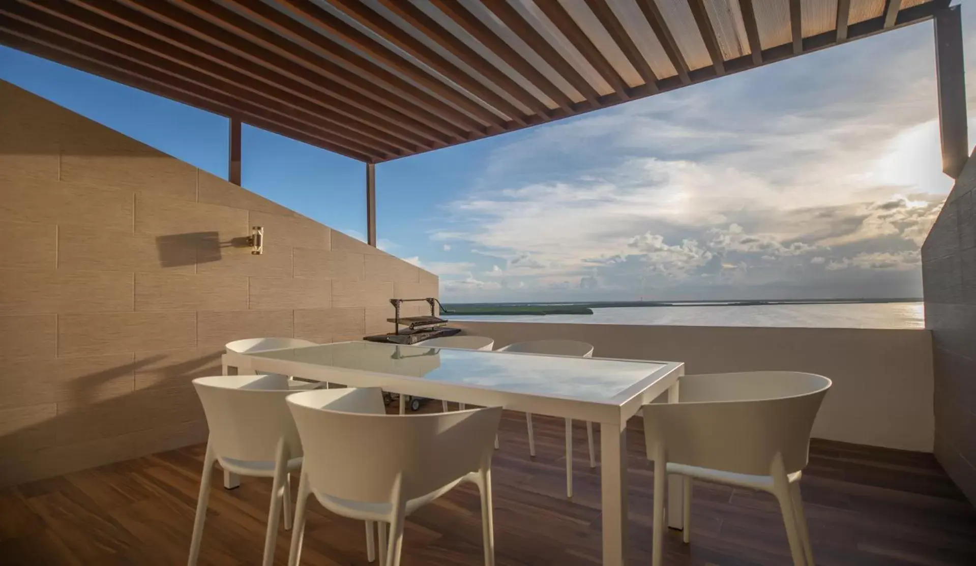 BBQ facilities, Balcony/Terrace in Beachfront Penthouses by LivIN Cancun