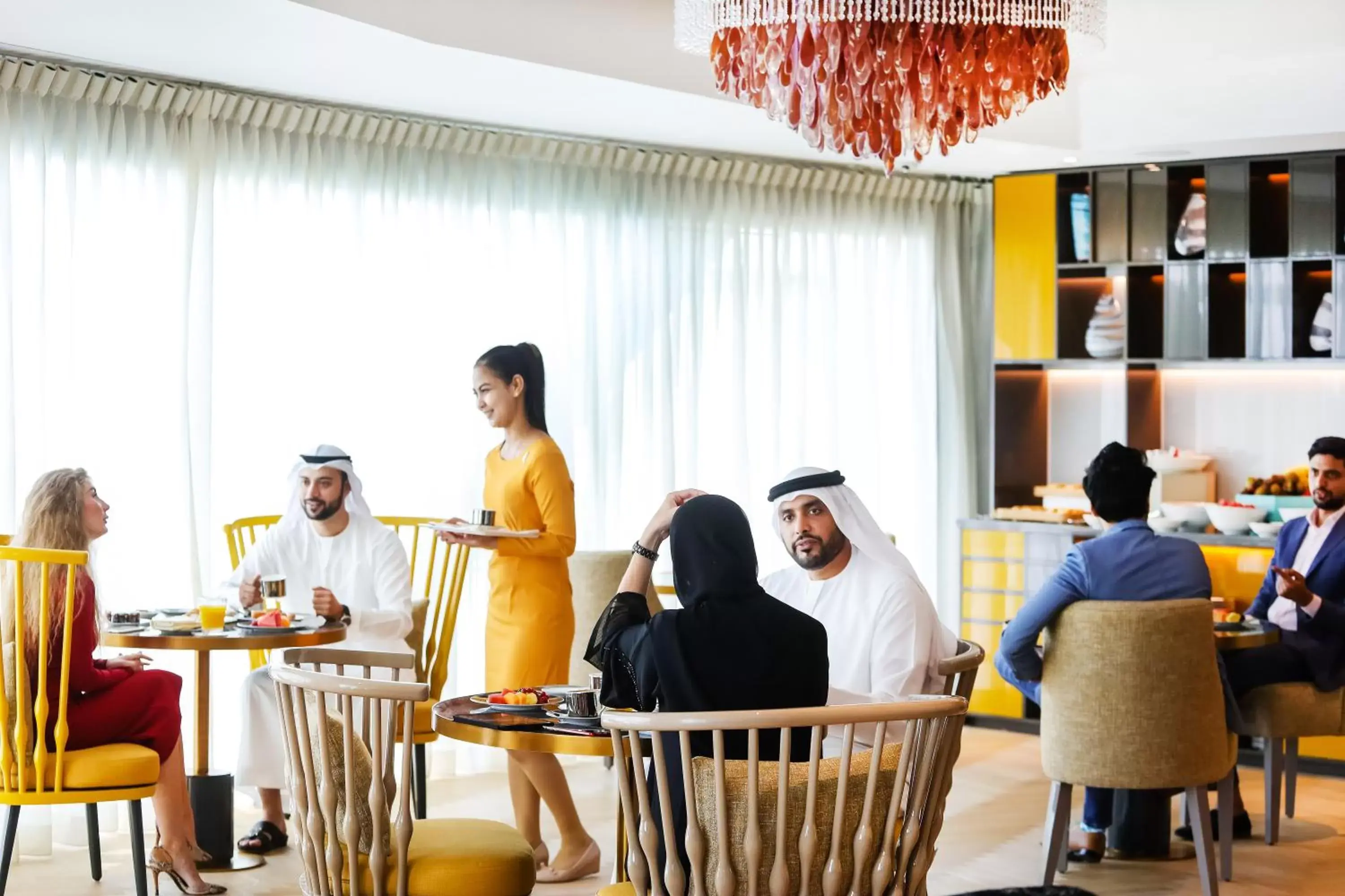 People in Andaz Capital Gate Abu Dhabi - a concept by Hyatt