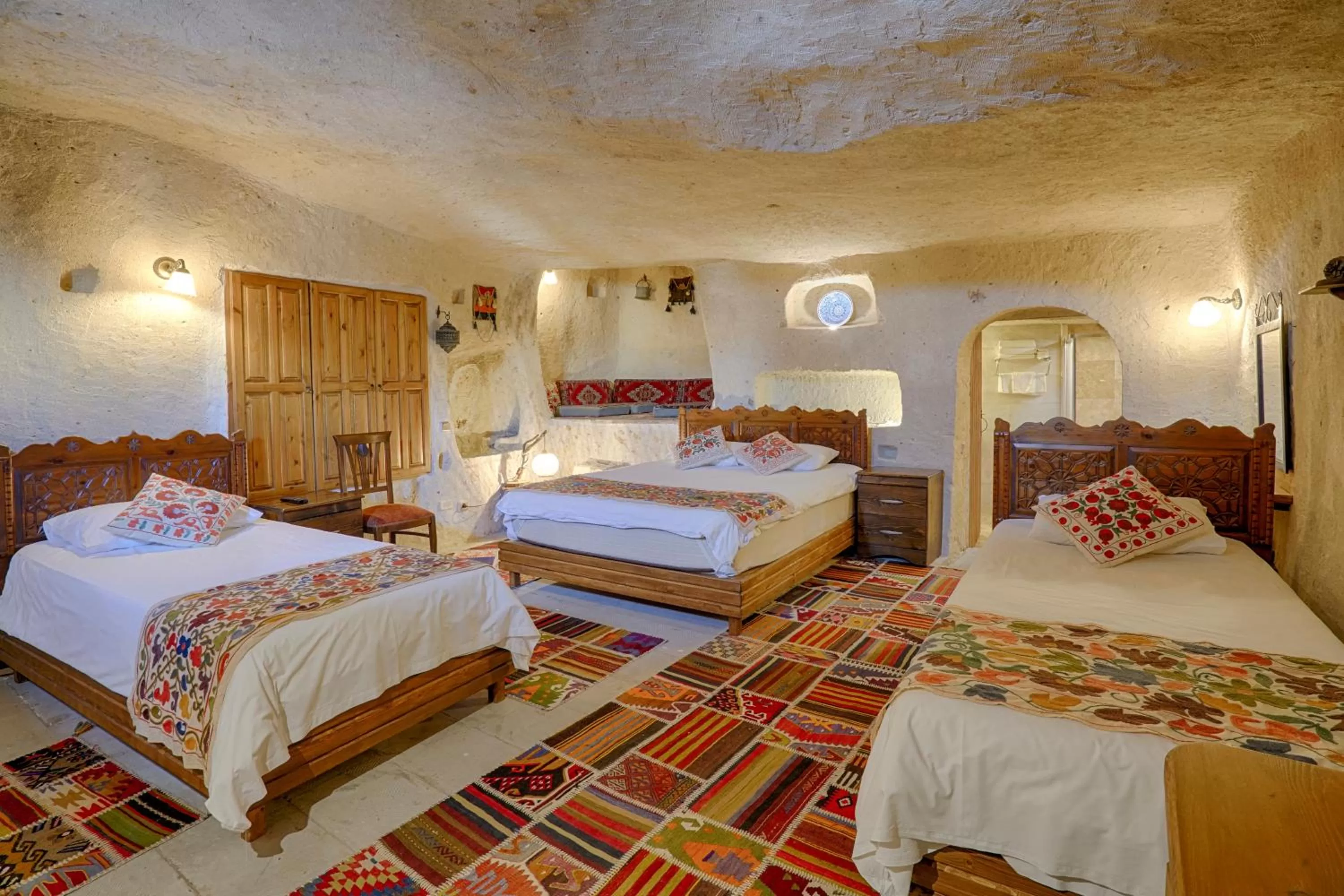 Bed in Tulip Cave Suites