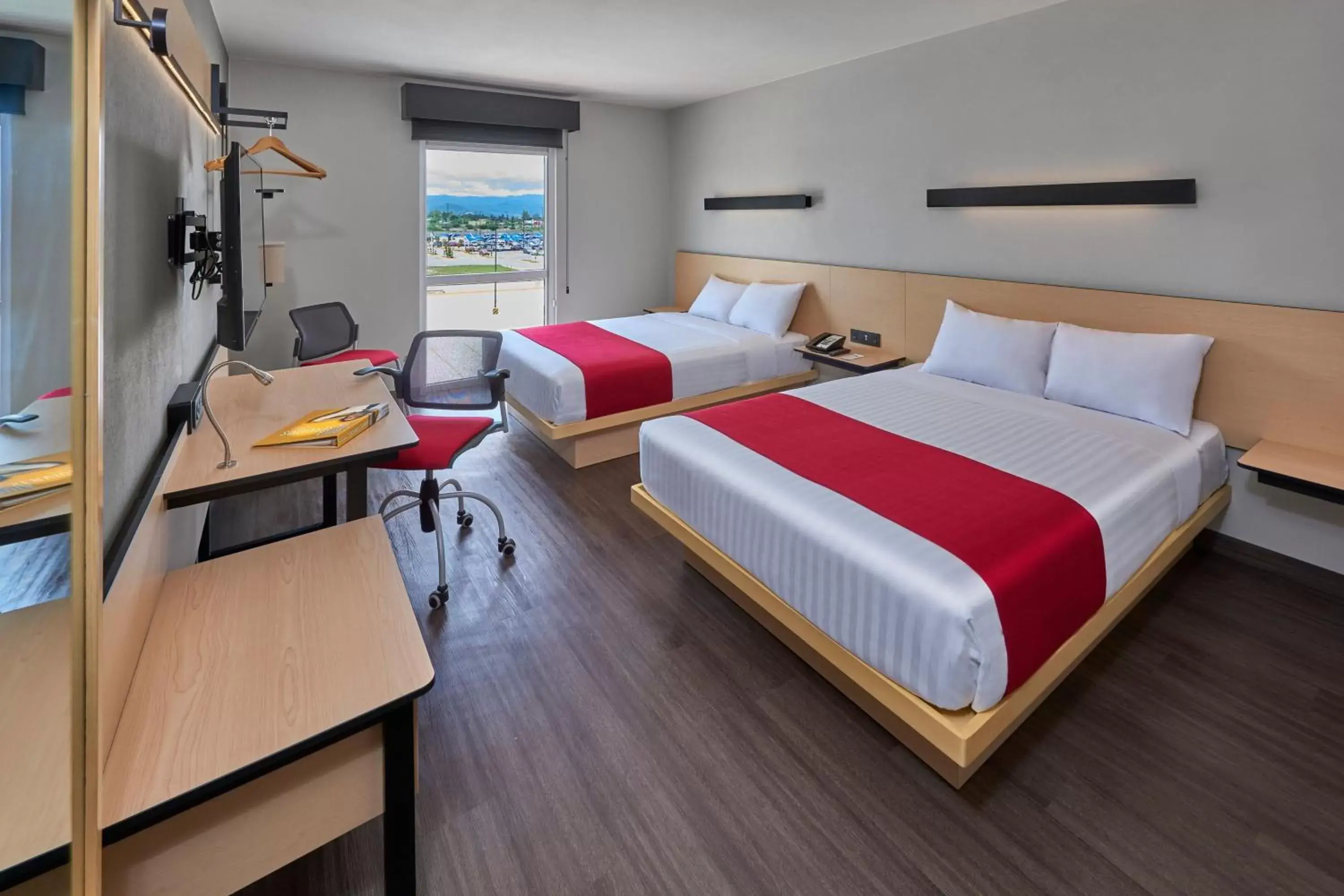 Photo of the whole room, Bed in City Express by Marriott Comitán