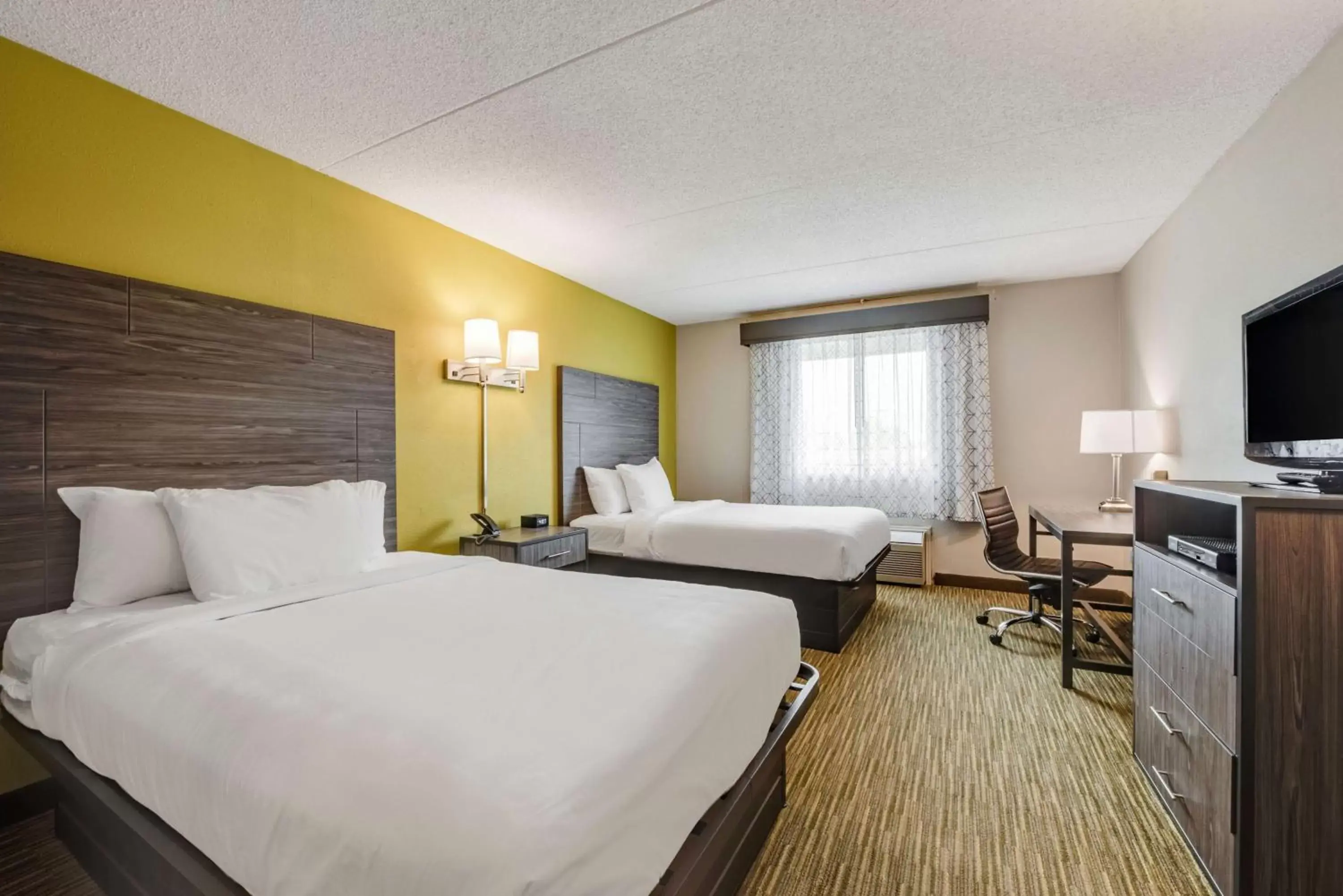 Bedroom in SureStay Plus Hotel by Best Western McGuire AFB Jackson