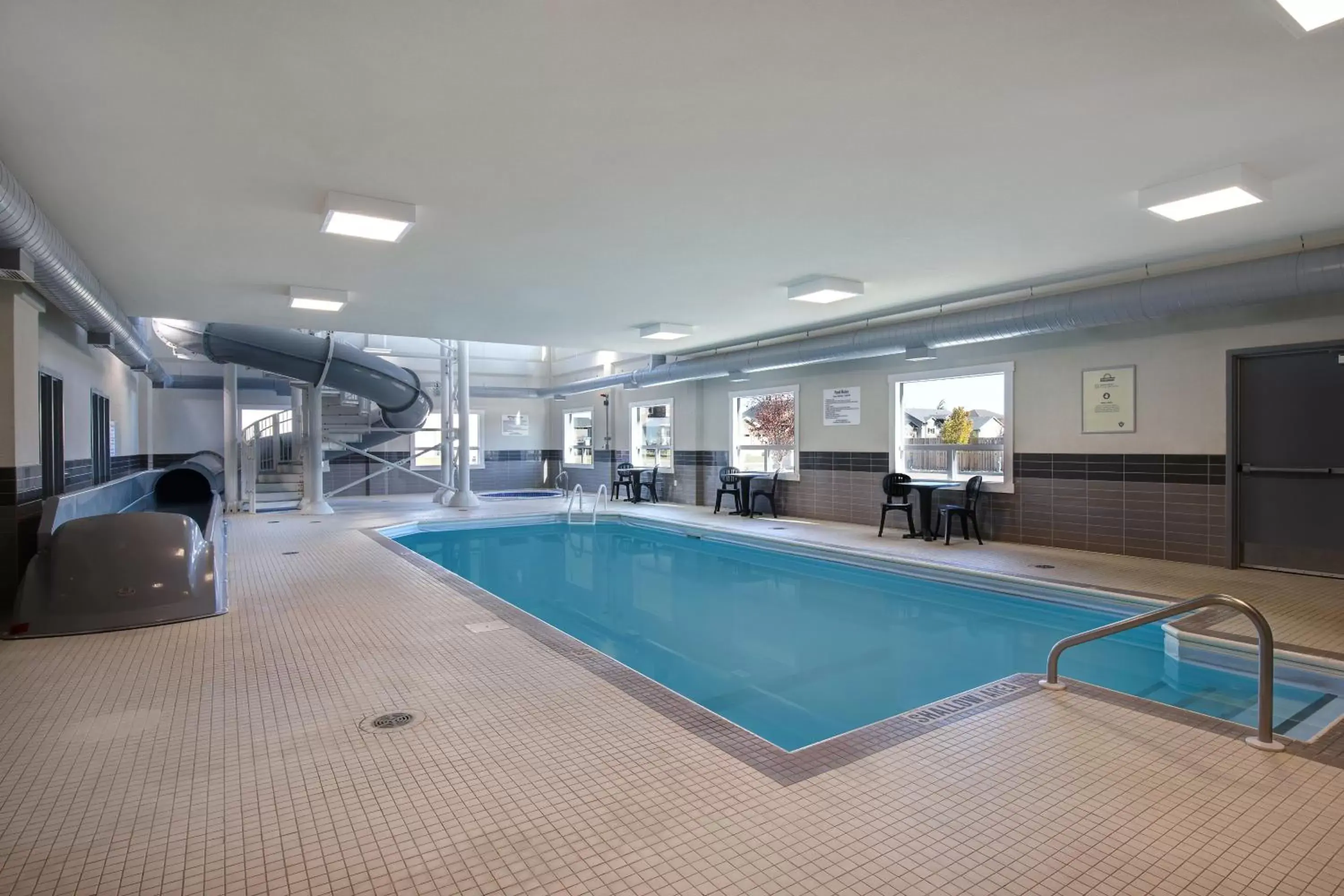 Swimming pool in Days Inn & Suites by Wyndham Warman Swimming pool in Days Inn & Suites by Wyndham Warman