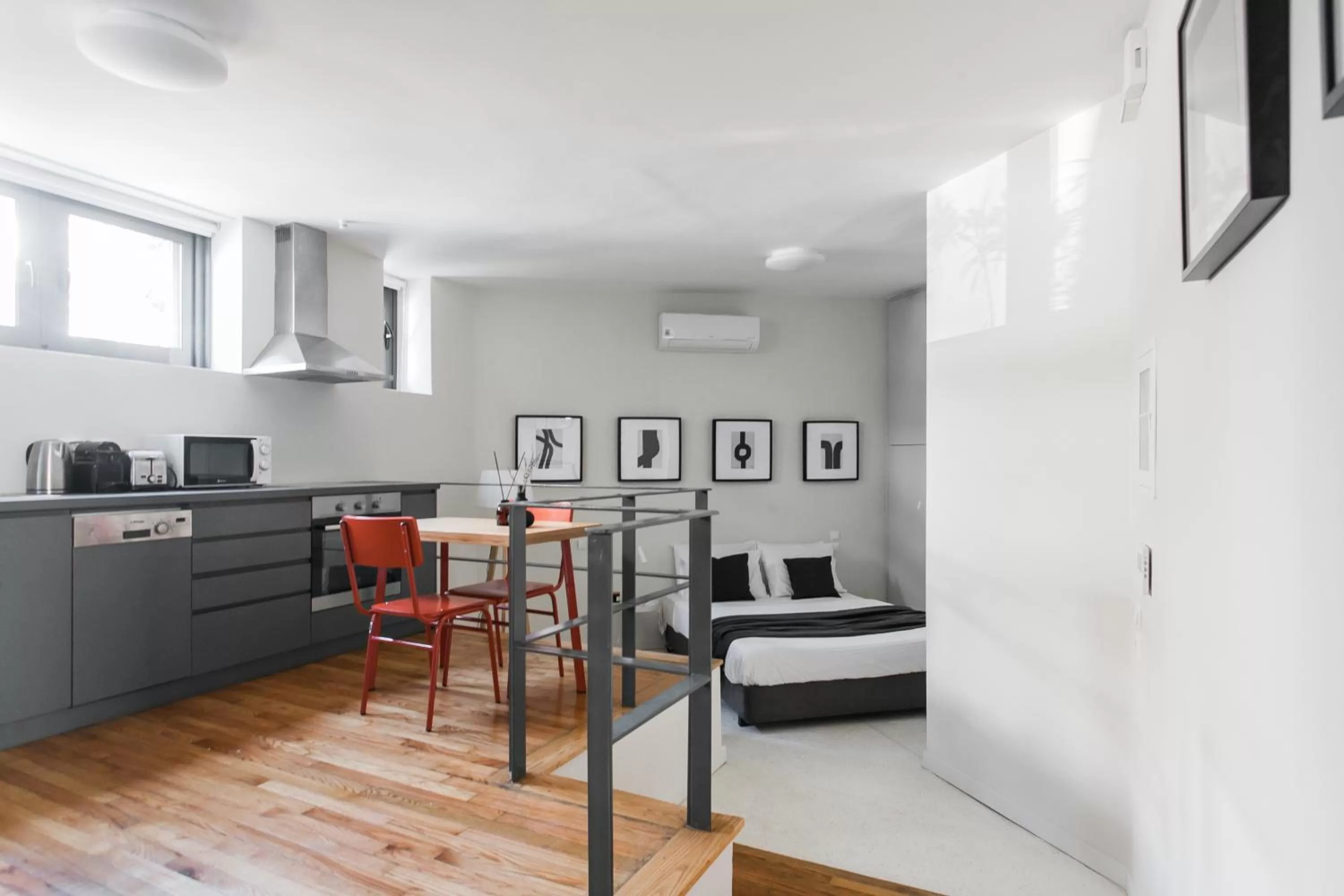 Bed, Dining Area in ZOIA The Hill by UPSTREET