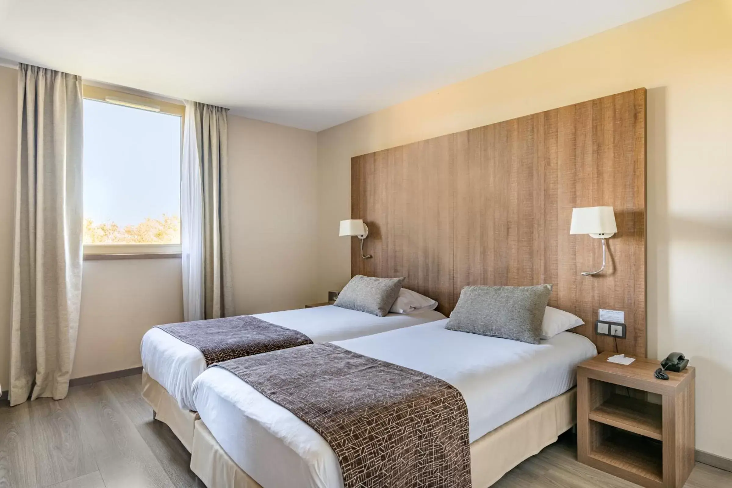 Bed in Best Western Hôtel des Barolles - Lyon Sud