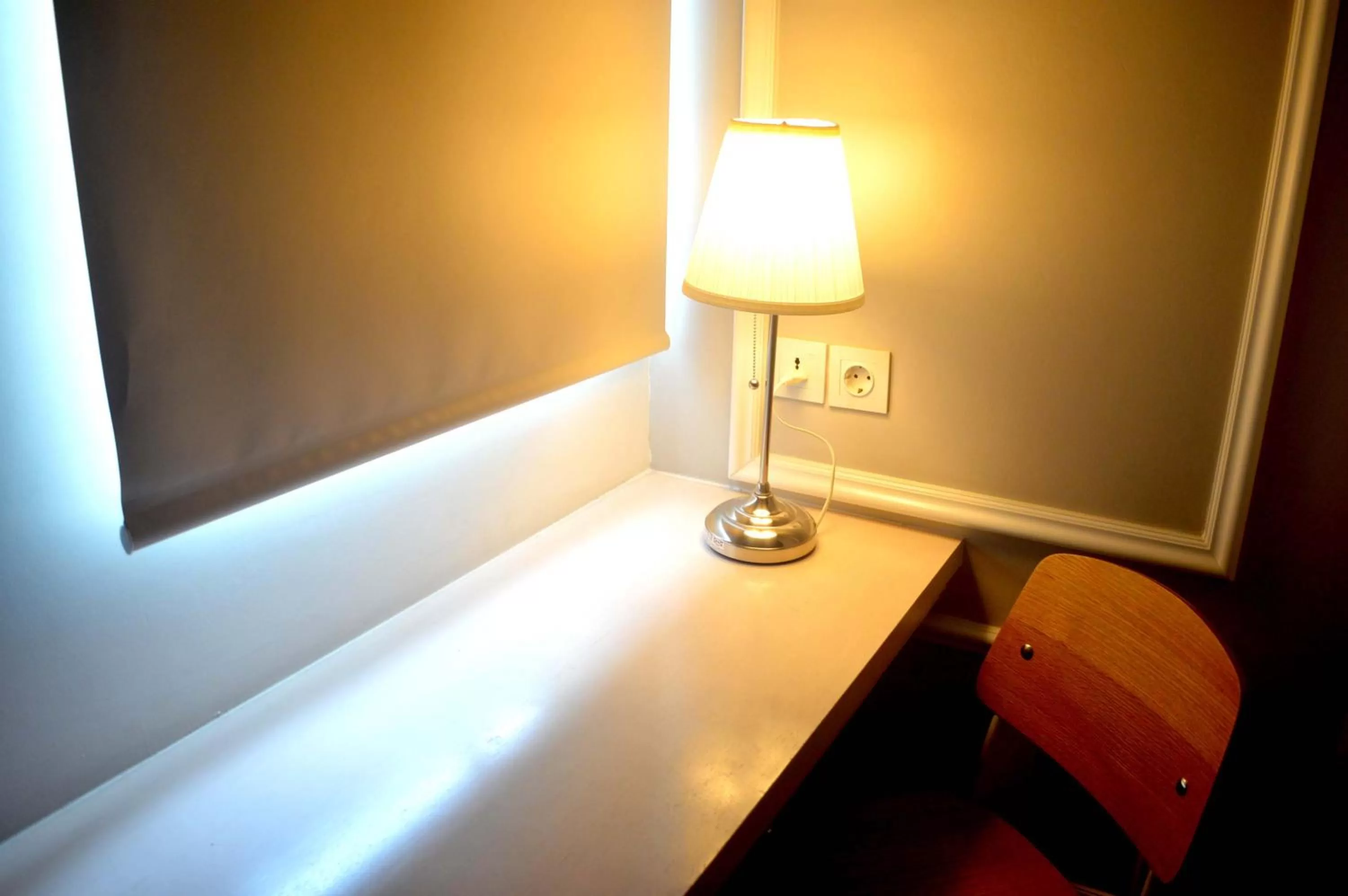 Seating area in MaxOne Signature Glodok Jakarta