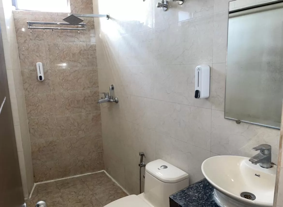 Bathroom in Tapasthali by Meera Hotels