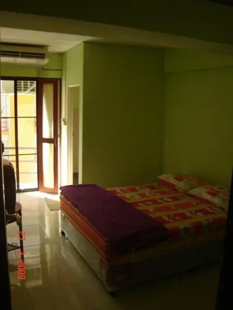 Bed in Kaset Guesthouse