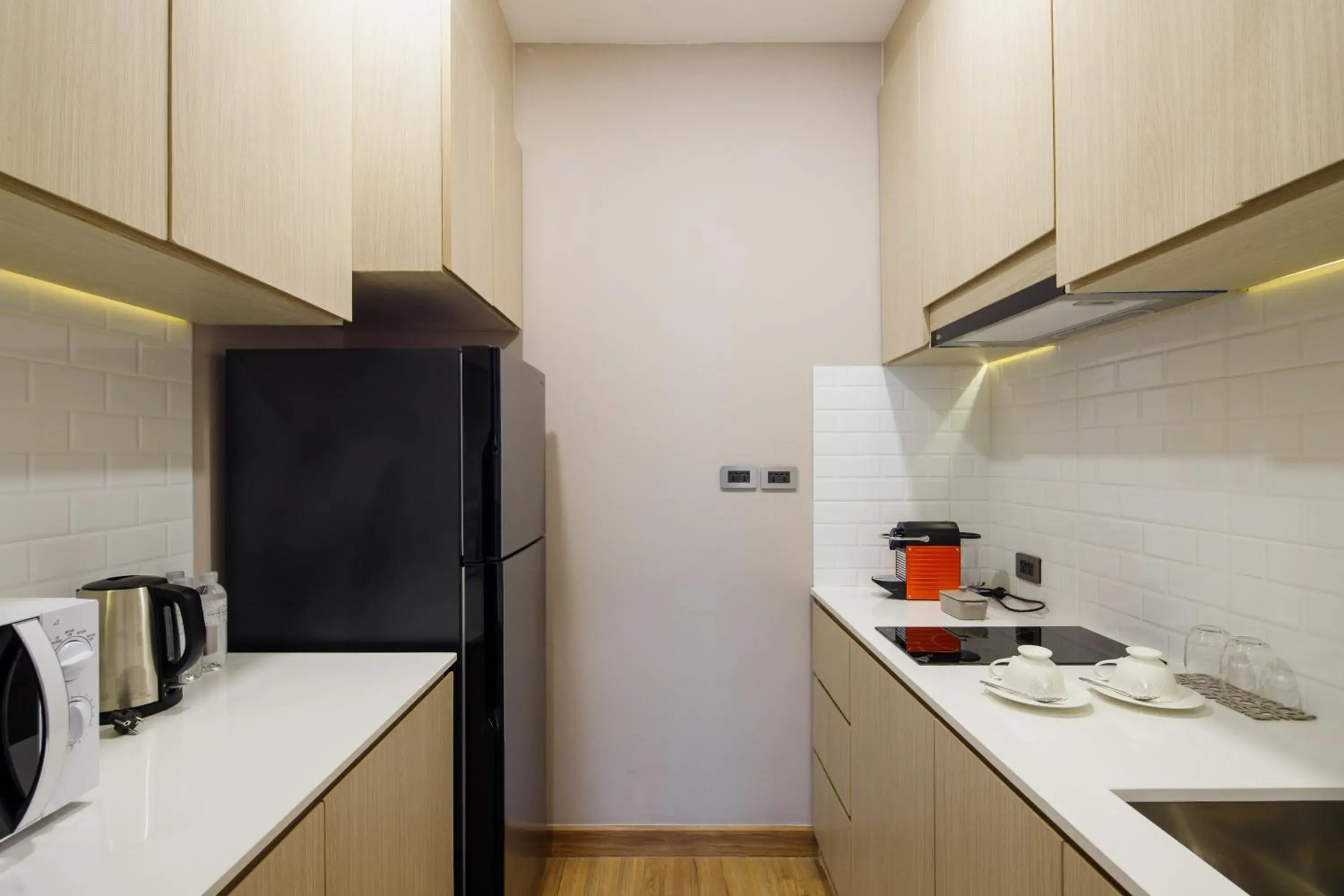 Kitchen/Kitchenette in Parc Borough City Resort -SHA Extra Plus