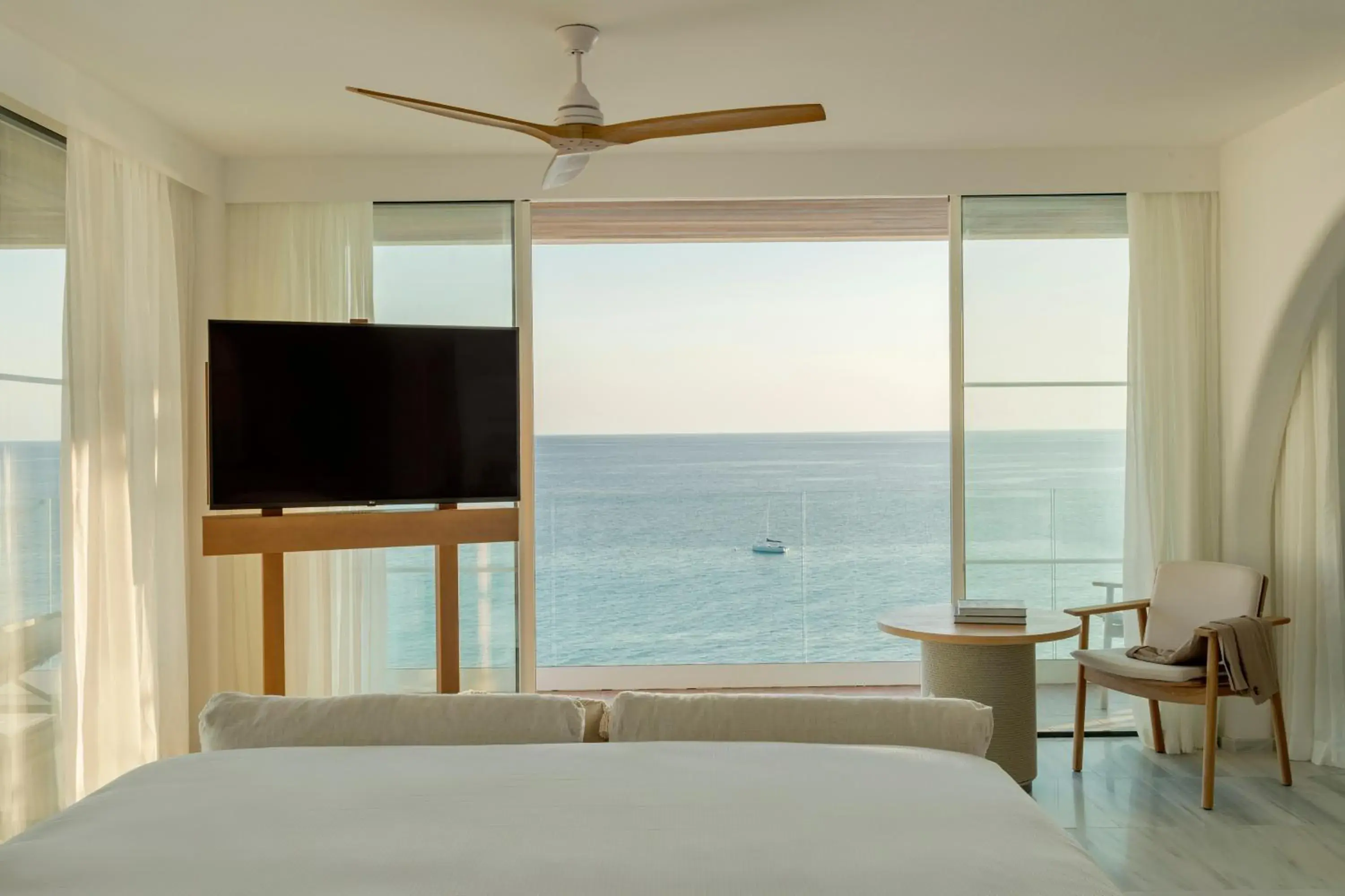 Bed, TV/Entertainment Center in Villa Le Blanc, a Gran Melia Hotel - The Leading Hotels of The World