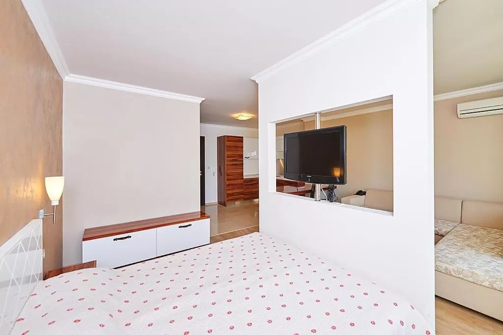 Bed in Penelopa Palace Apart Hotel & SPA