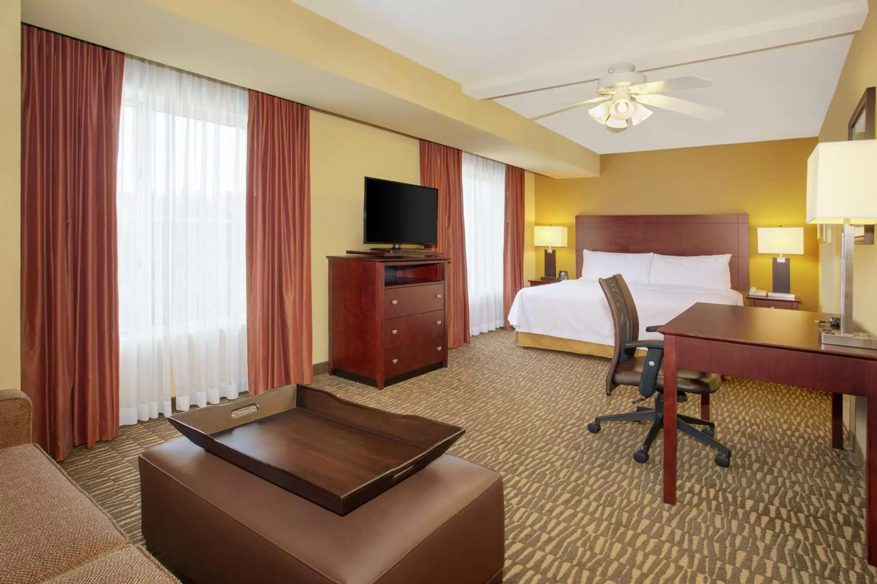 Bedroom, TV/Entertainment Center in Homewood Suites by Hilton Tampa-Brandon