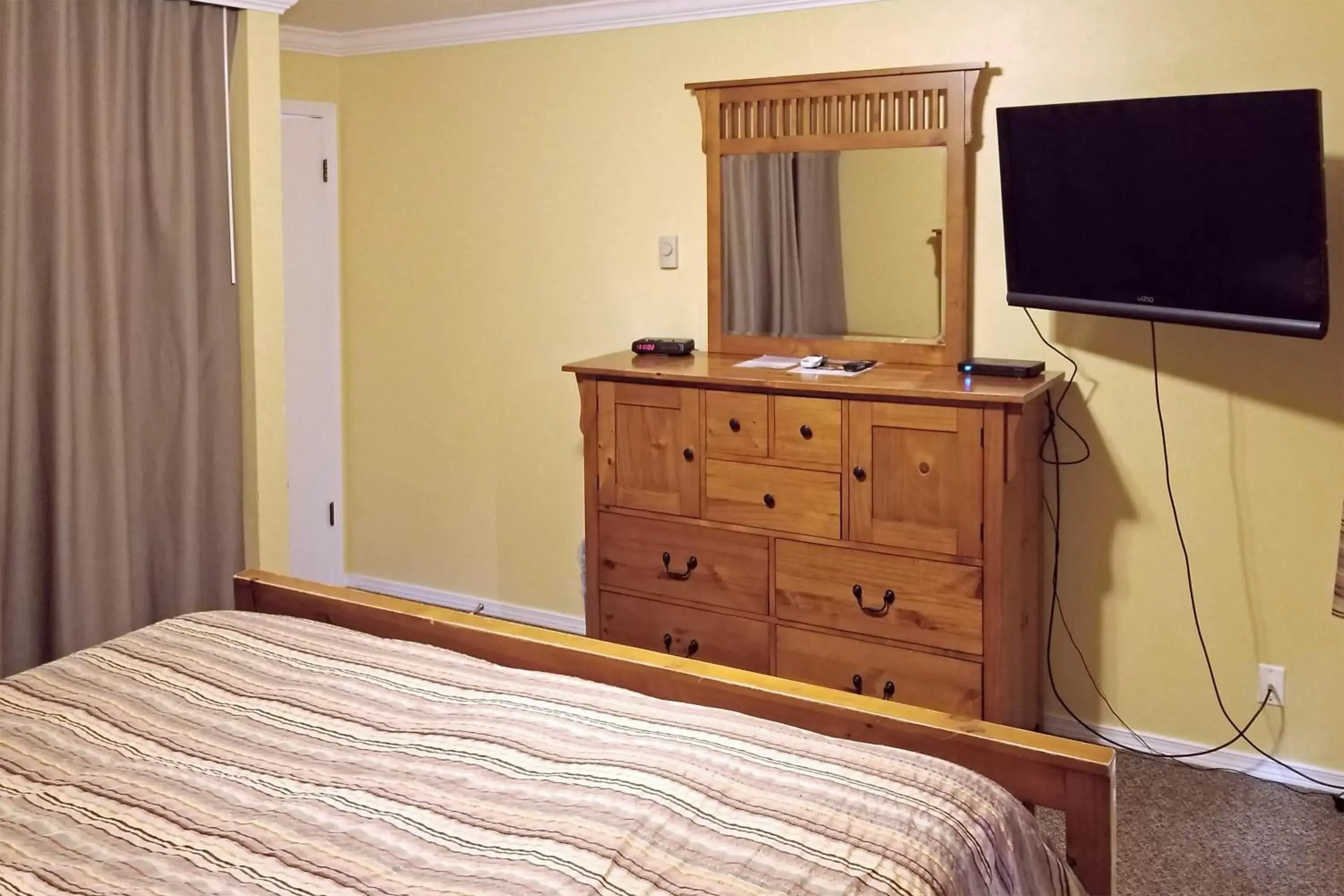 Bedroom, TV/Entertainment Center in Ocean Terrace Condominiums