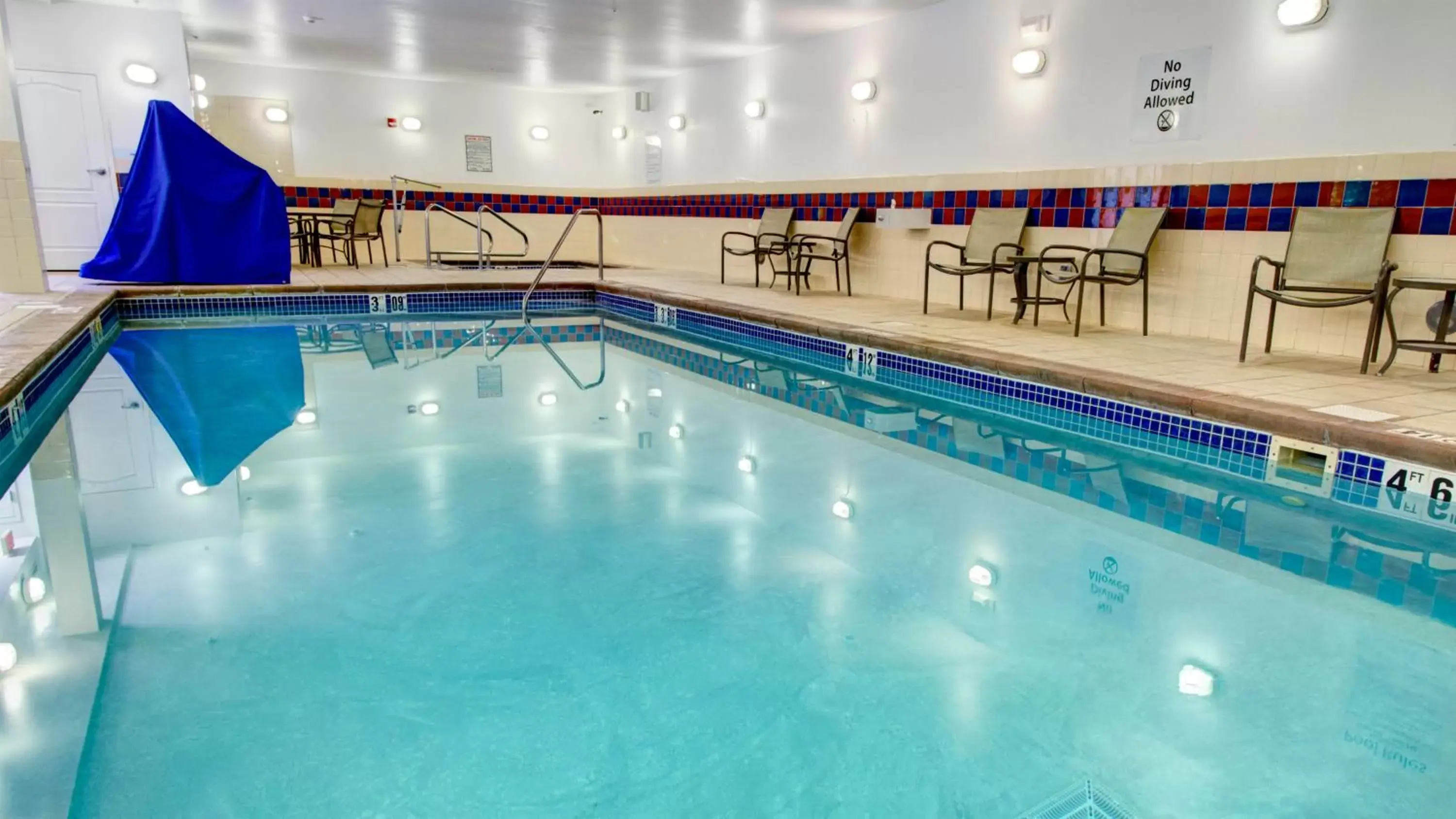 Swimming Pool in Holiday Inn Express & Suites Sioux City-South, an IHG Hotel
