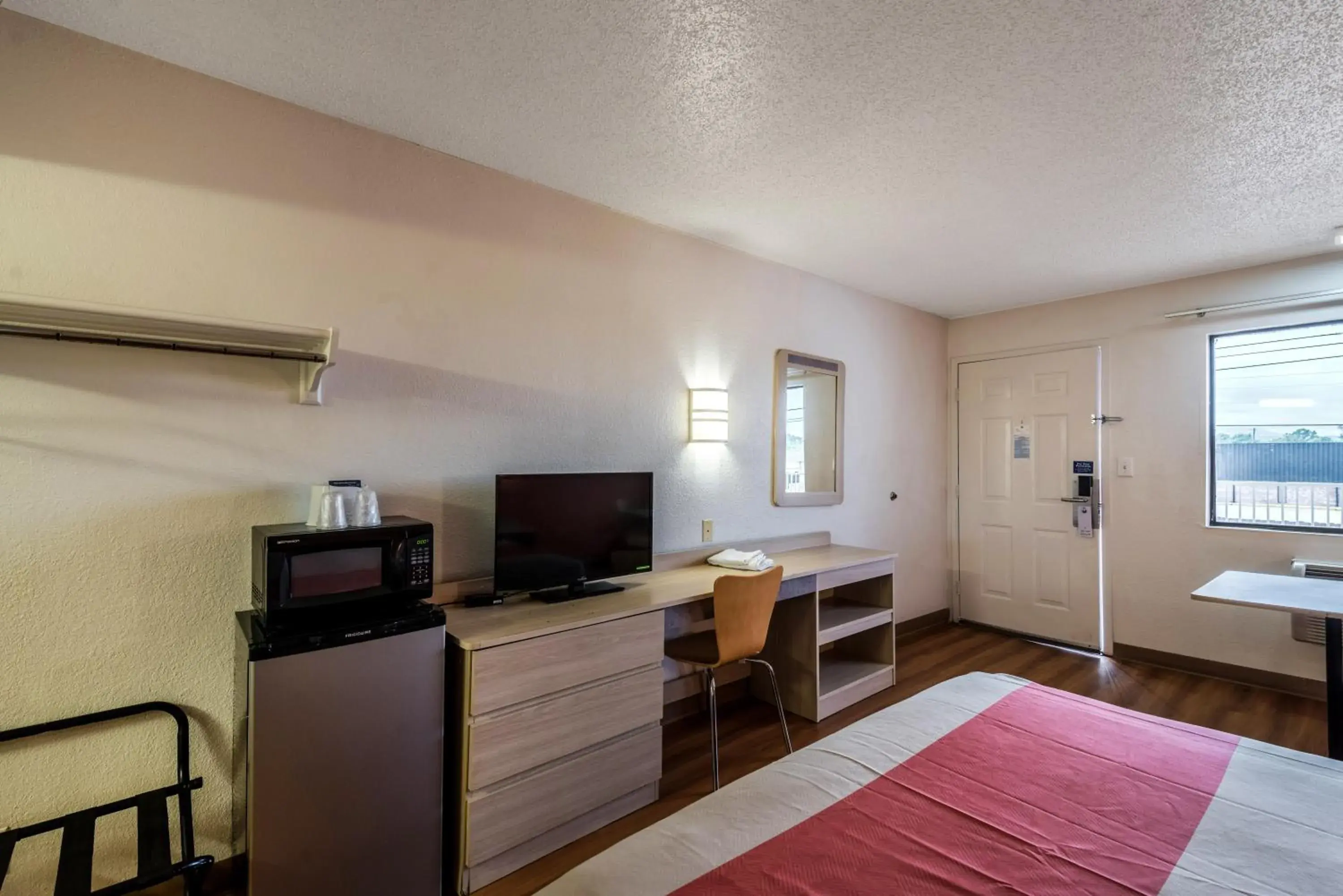 Bedroom, TV/Entertainment Center in Motel 6-Anniston, AL