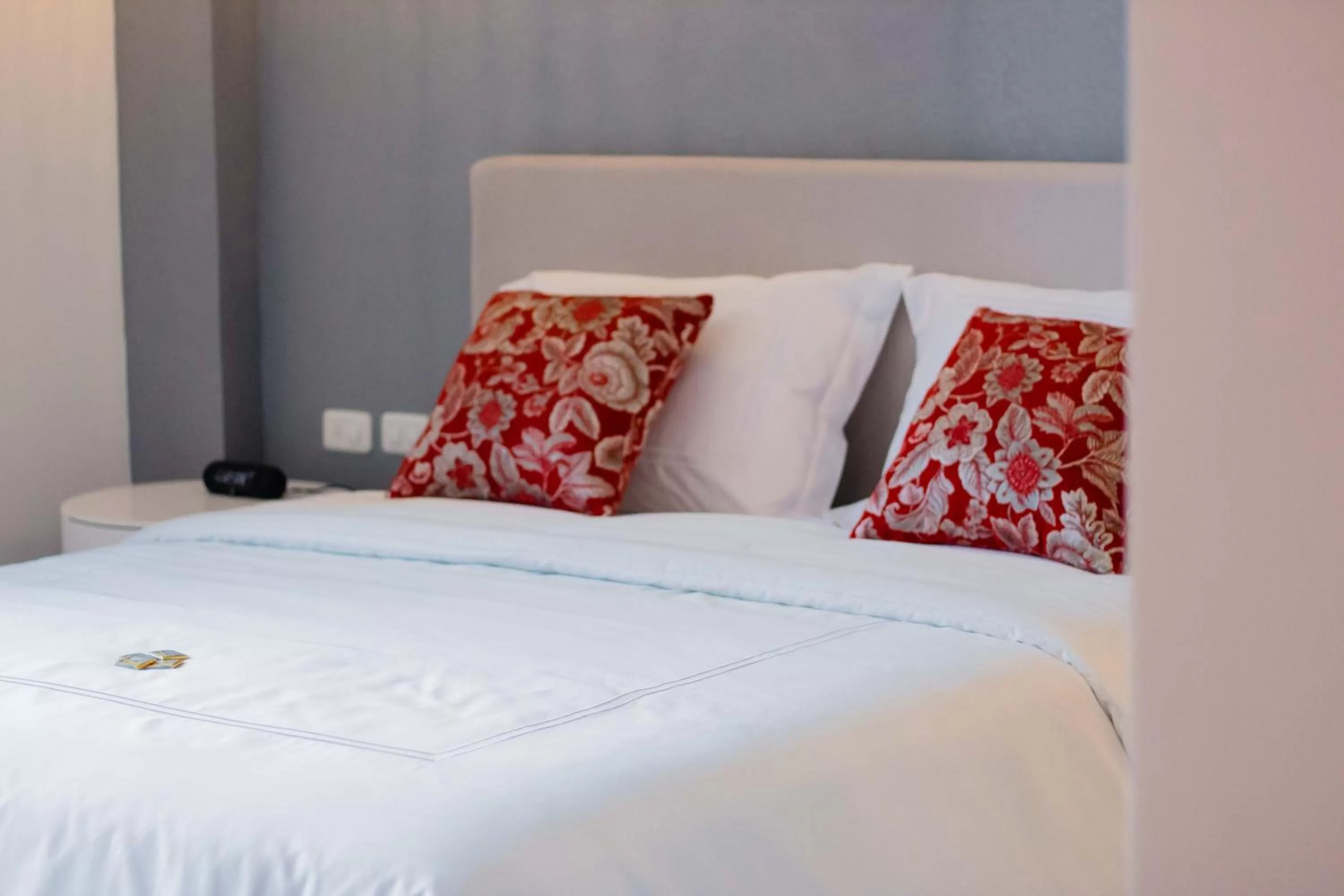 Bed in Adamas House Hotel Boutique