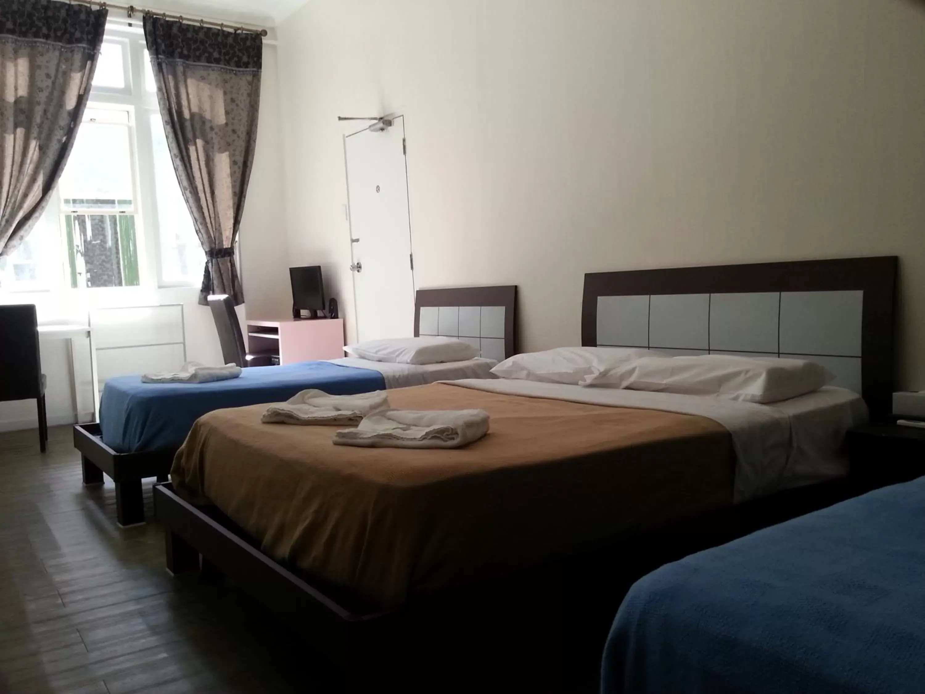 Photo of the whole room, Bed in Central Private Hotel