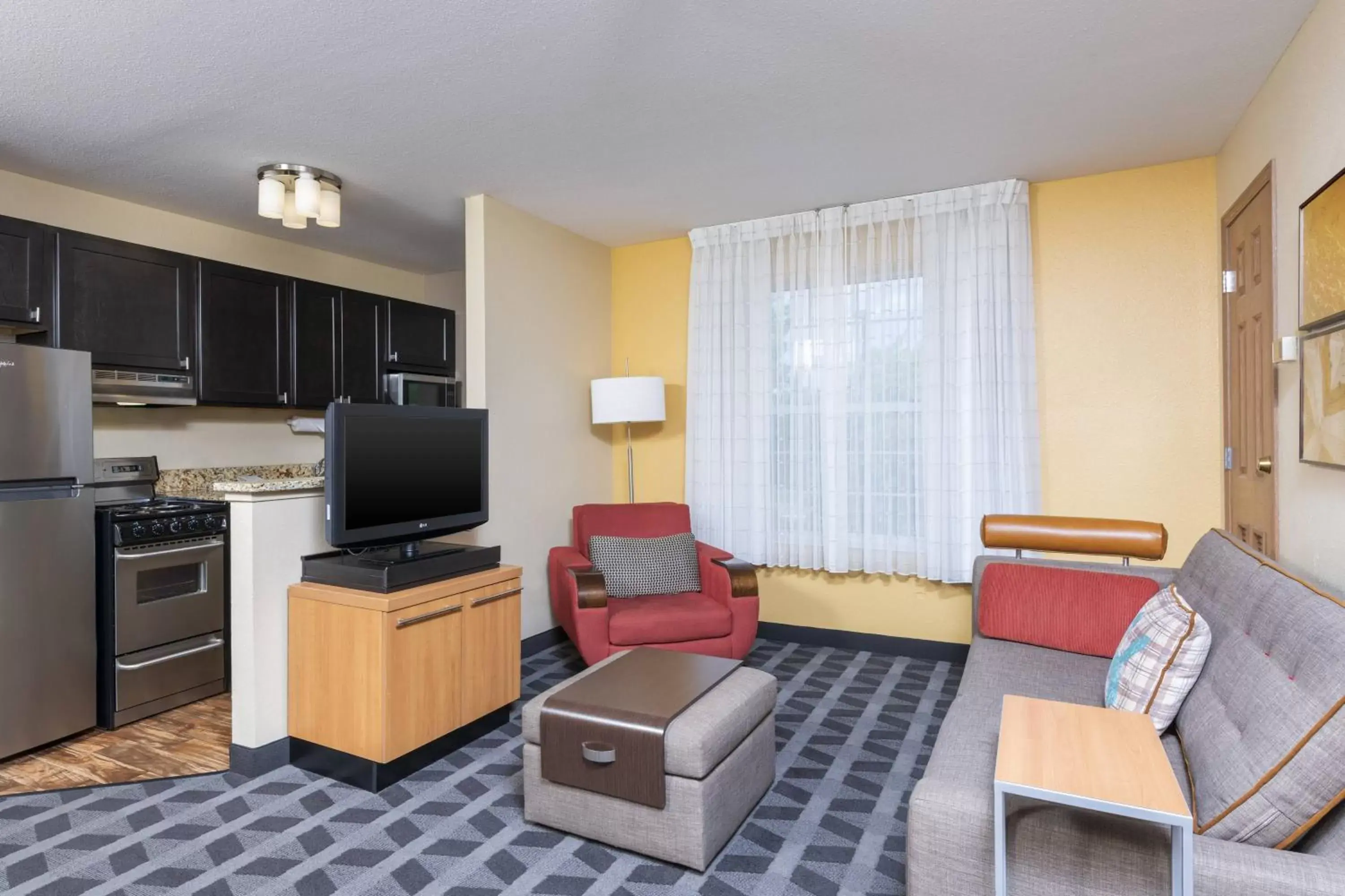 Living room, Seating Area in TownePlace Suites by Marriott East Lansing