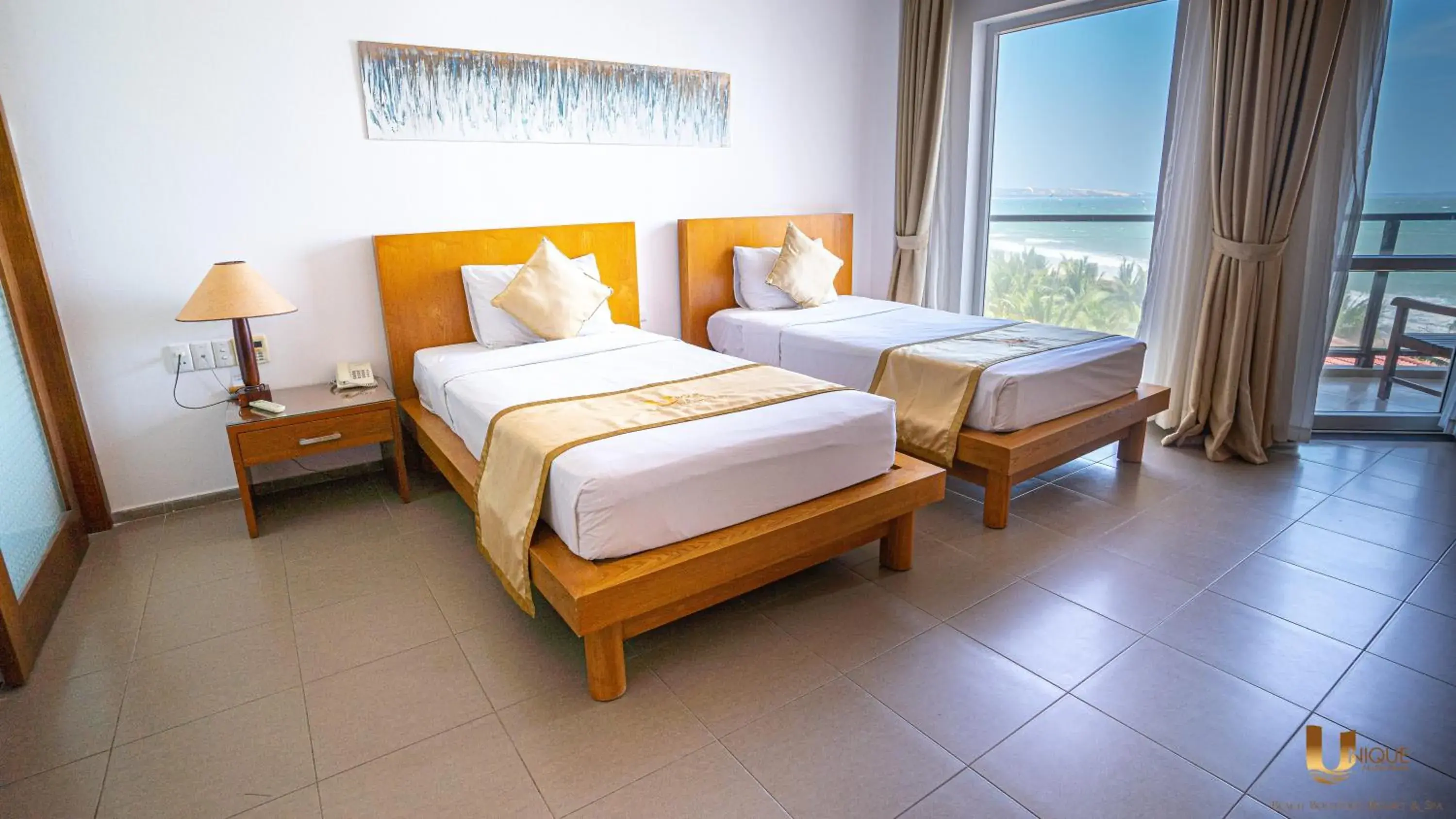 Bed in Unique Mui Ne Resort and Spa Bed in Unique Mui Ne Resort and Spa