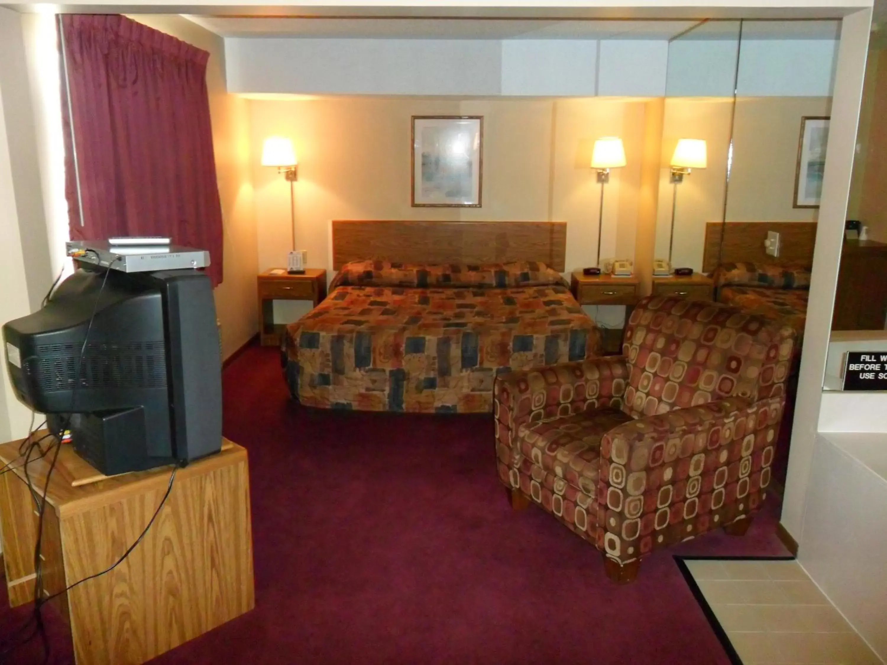 Photo of the whole room, Seating Area in Super 8 by Wyndham Chadron NE