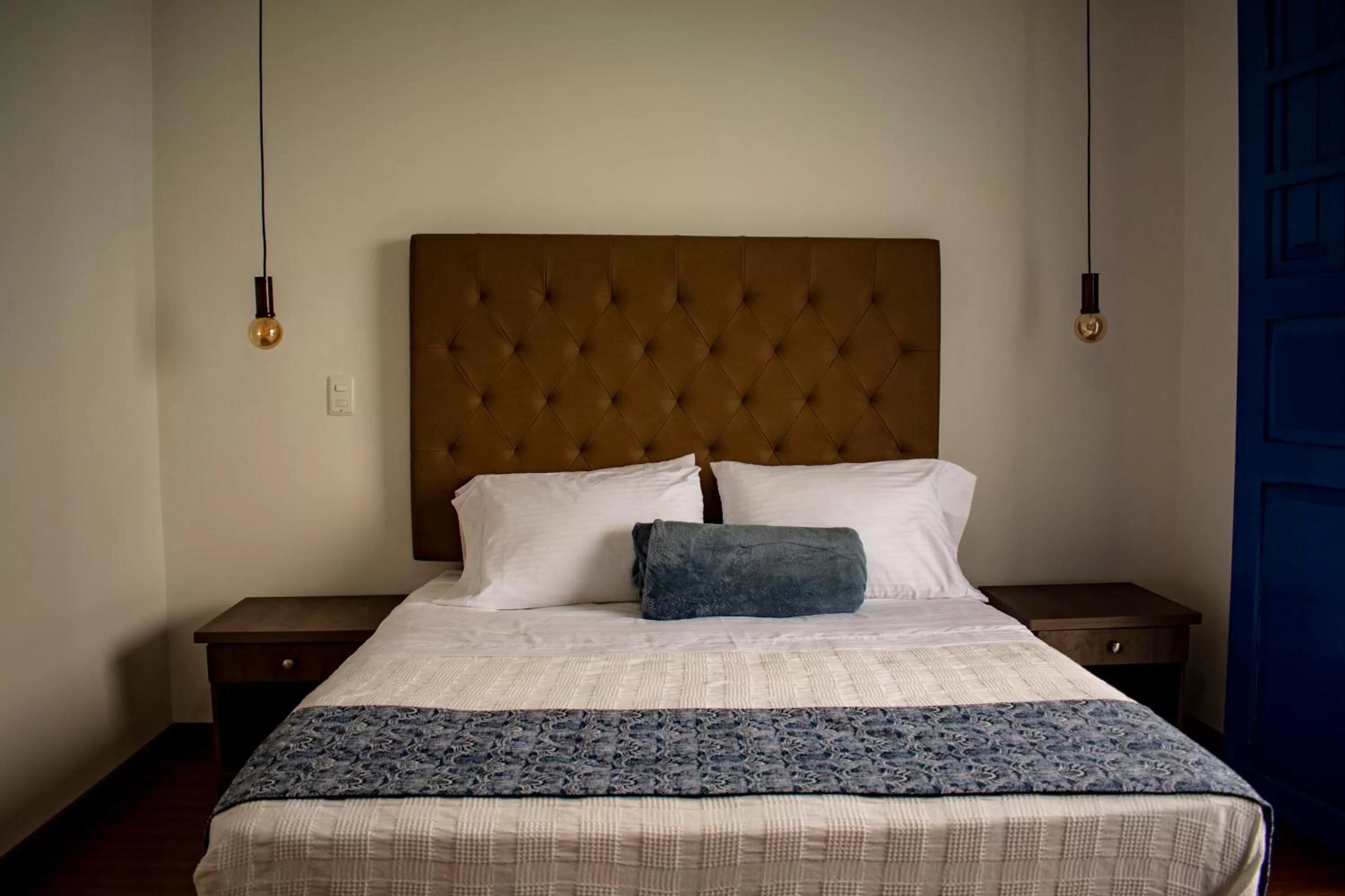 Bed in El Reloj Casa Hotel