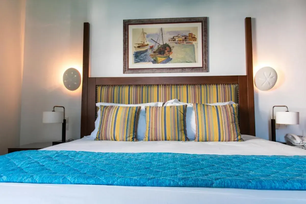 Bed in Poseidon Hotel Suites