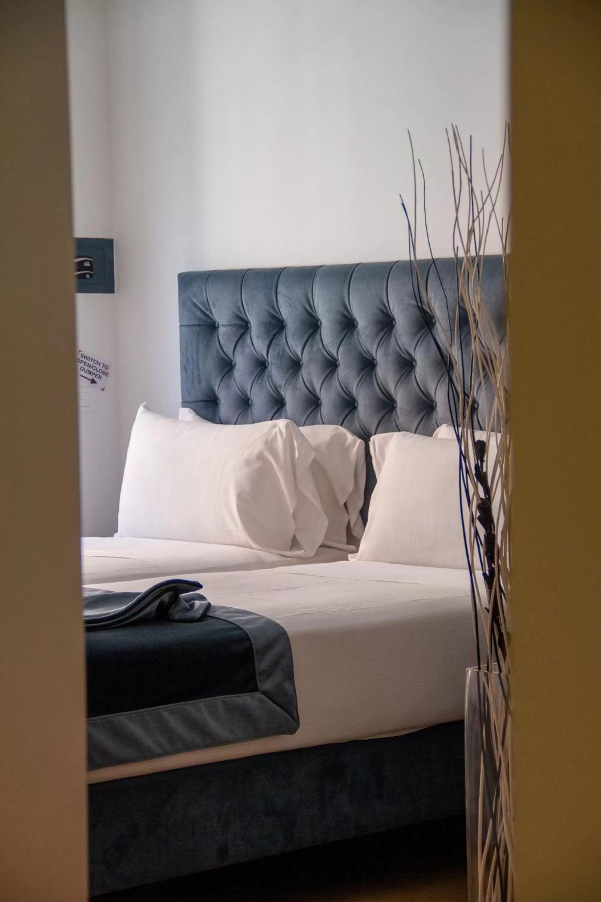 Bed in Michelangelo Vatican Rooms