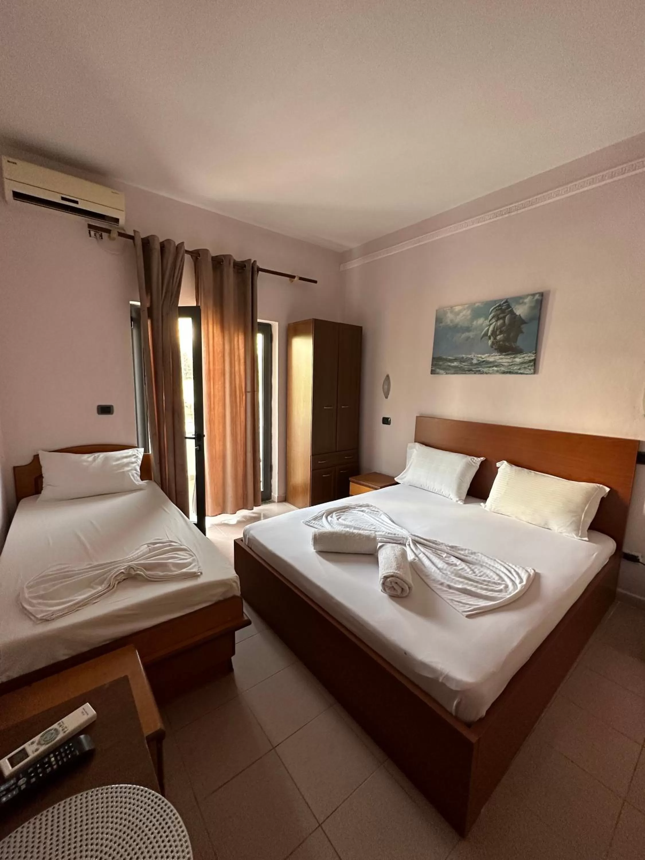 Bed in Seashell Beach Rooms