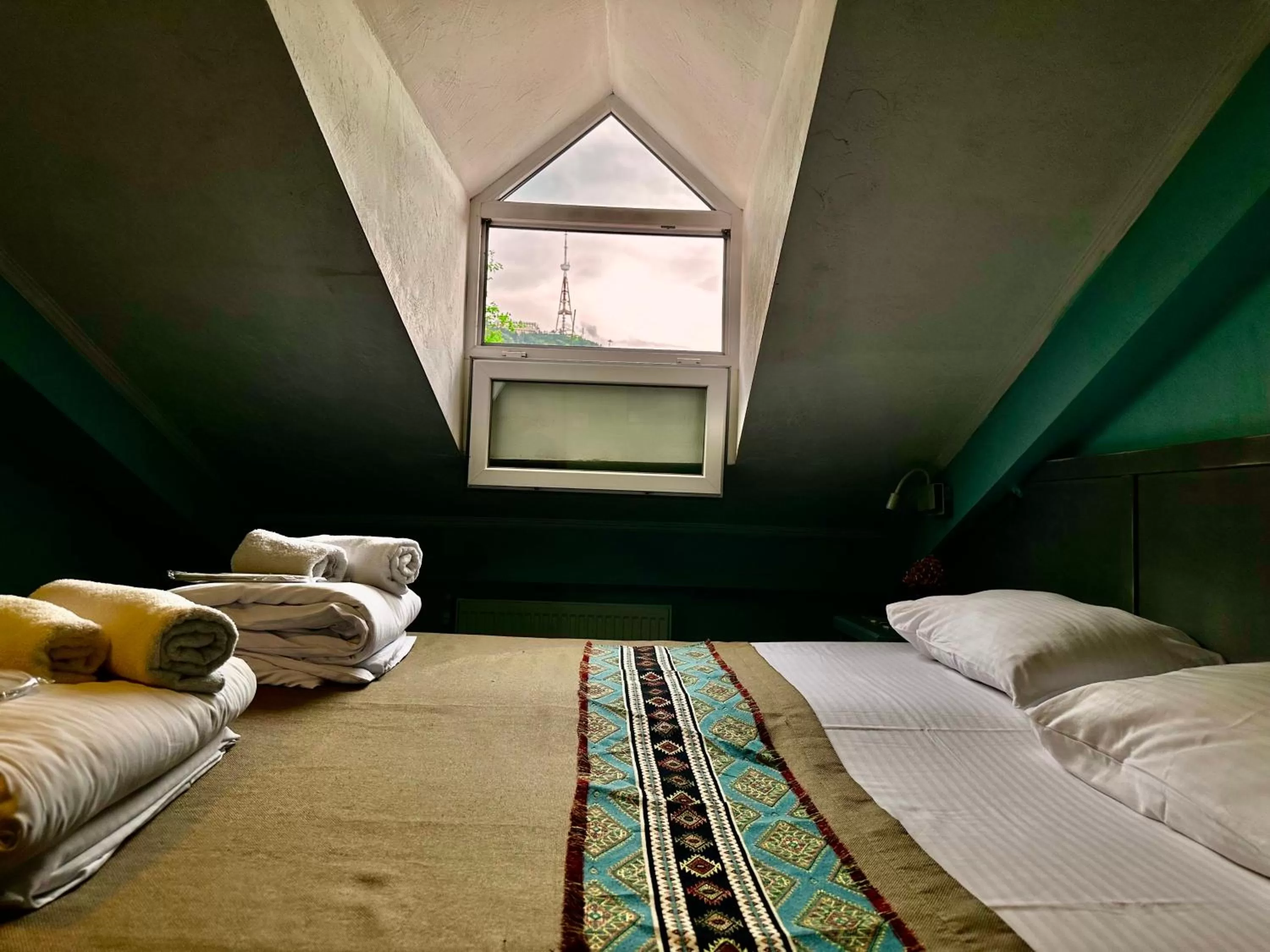 Bed in Kindli Boutique Hotel