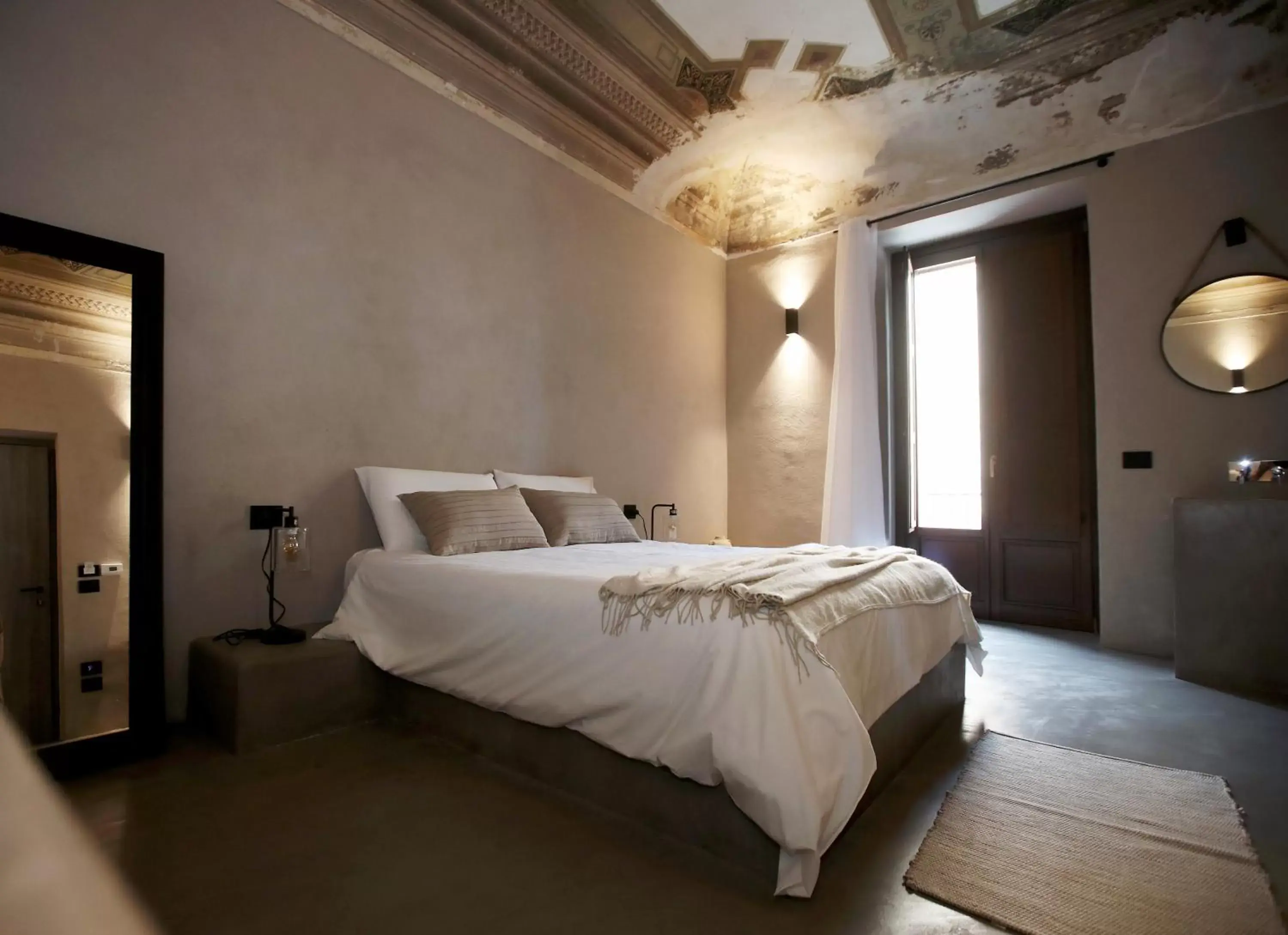 Bed in Casa Nostra Luxury Suites