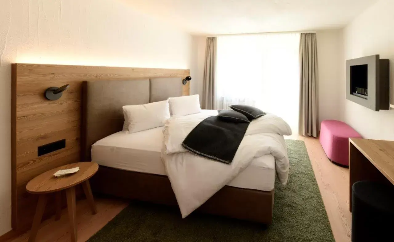 Bed in Hotel Bernina