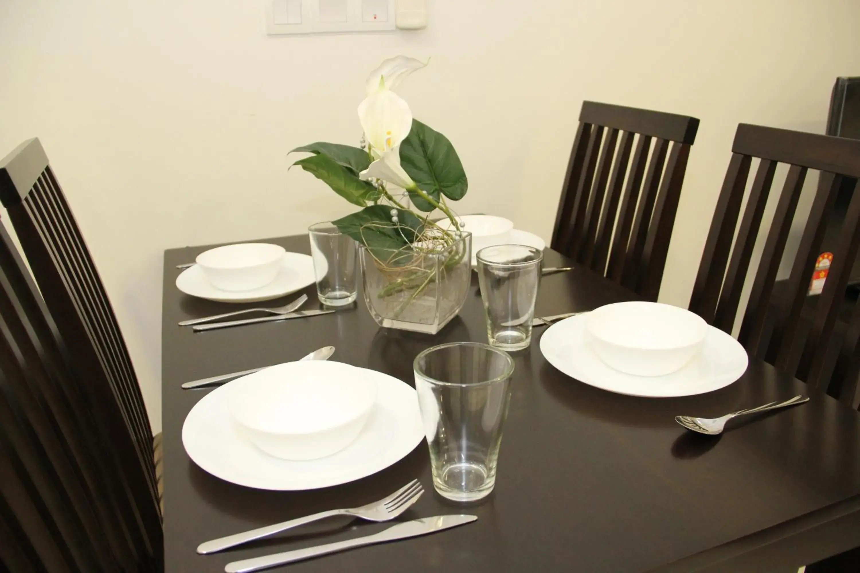 Dining Area in Summer Suites Residences by Subhome