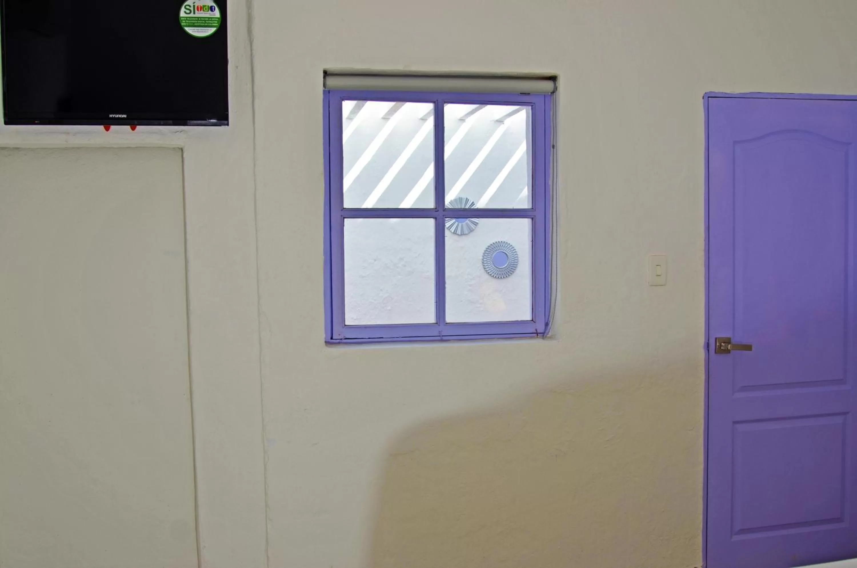 TV and multimedia, TV/Entertainment Center in Faro de Alejandría Hostel