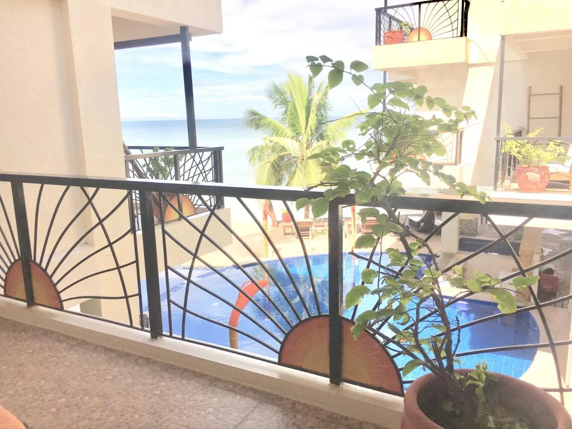 Balcony/Terrace, Pool View in Sunset At Aninuan Beach Resort