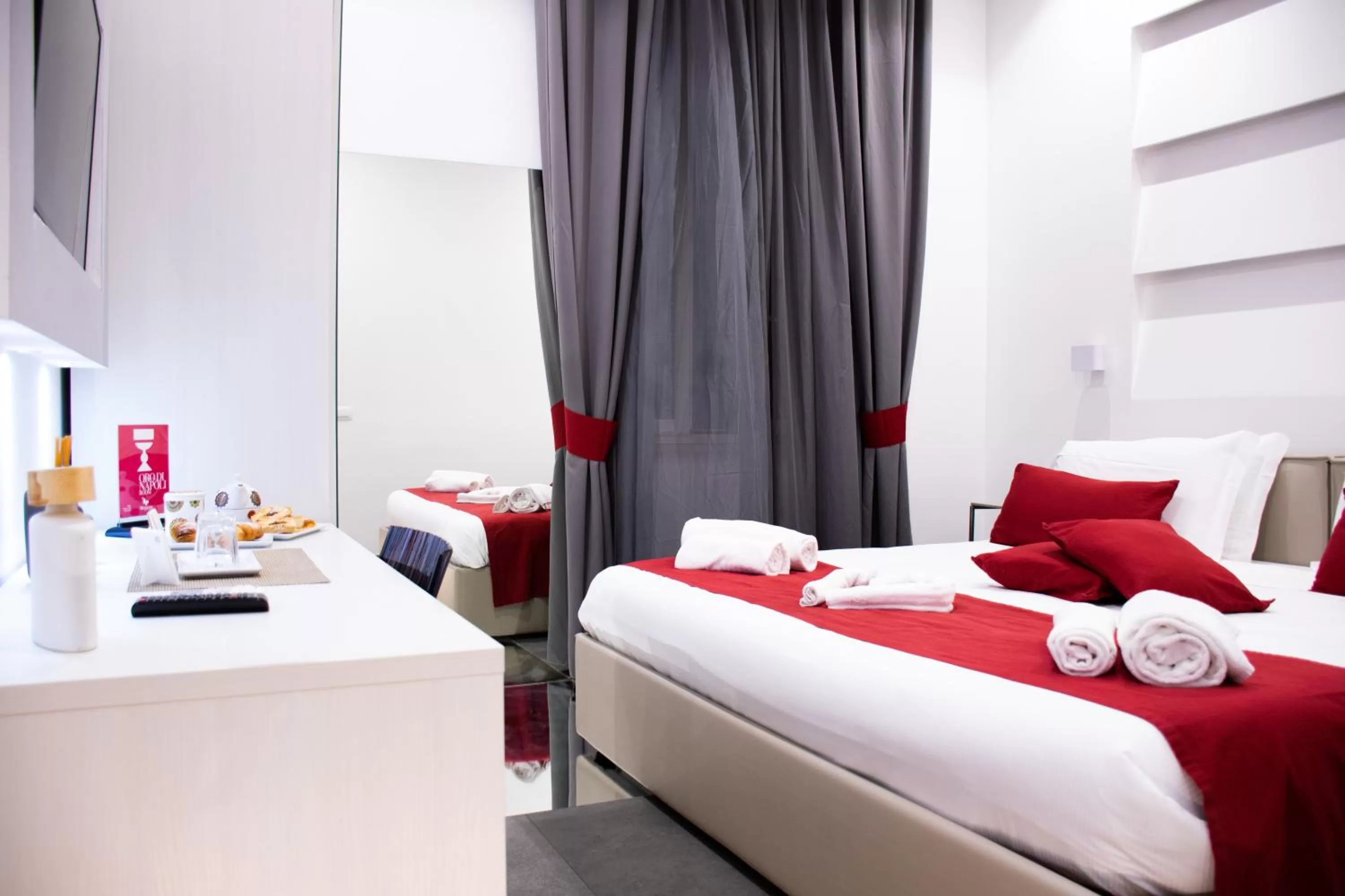 Bed in Megaris Luxury Suite Rooms