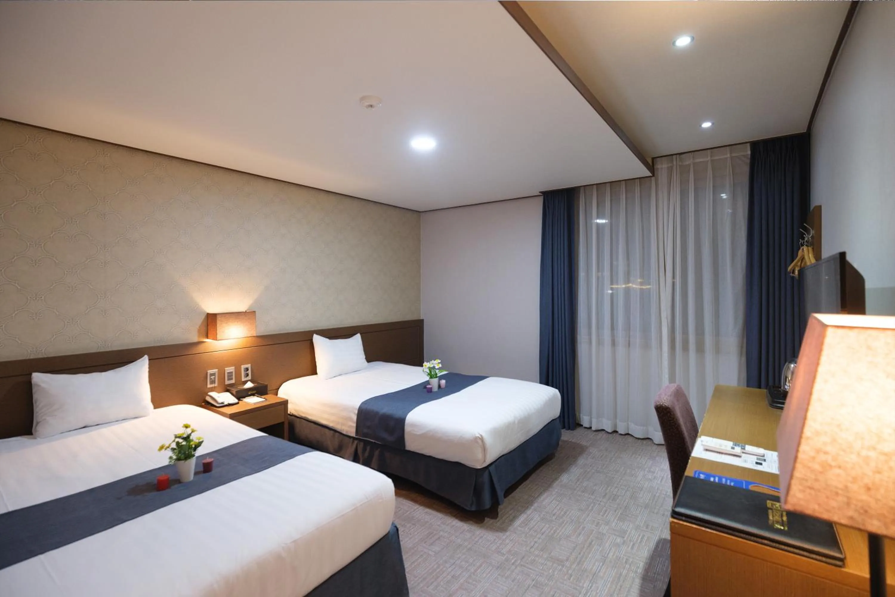 Photo of the whole room, Bed in Benikea Hotel Jeju