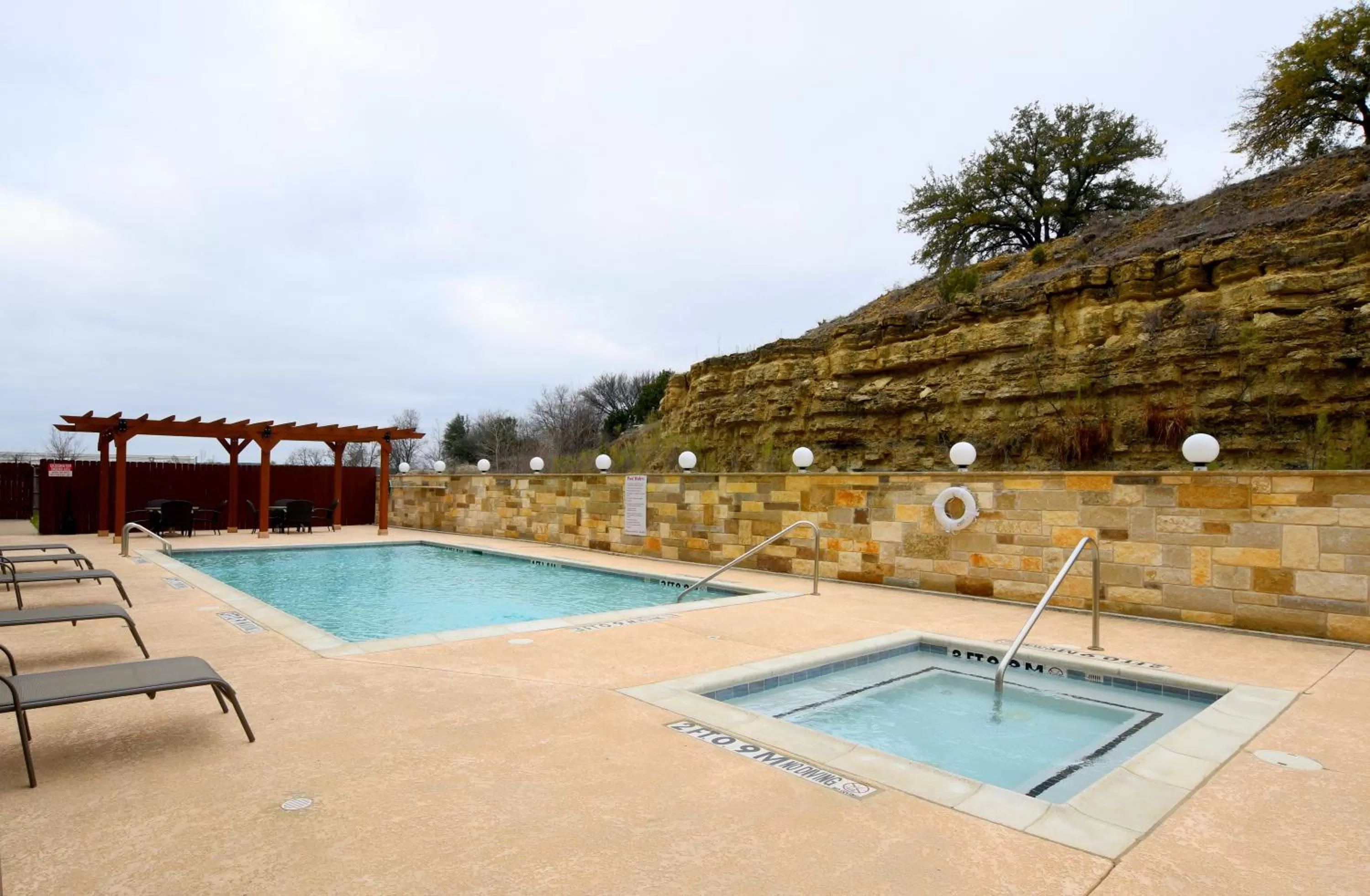 Swimming pool in Baymont Inn & Suites by Wyndham Glen Rose