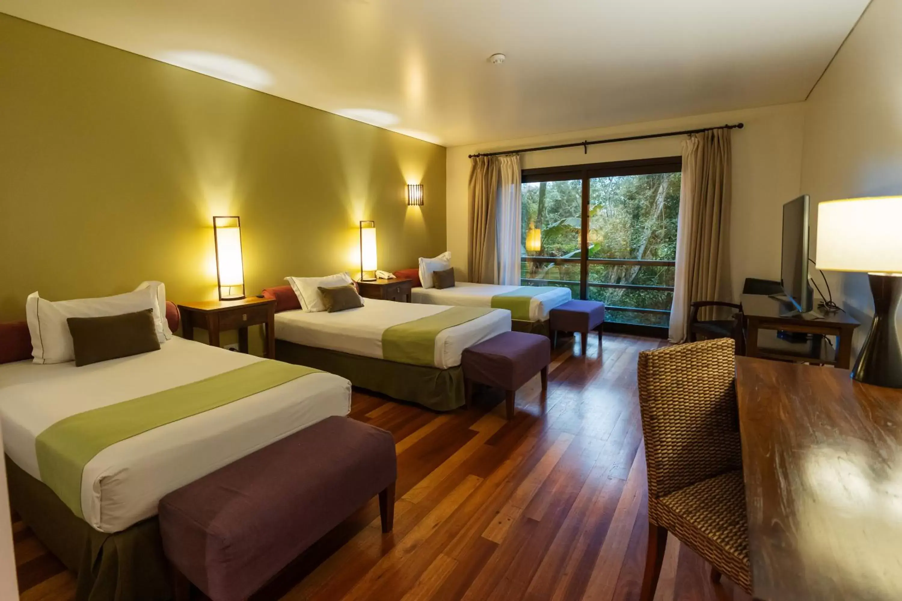 Bed in Loi Suites Iguazu Hotel