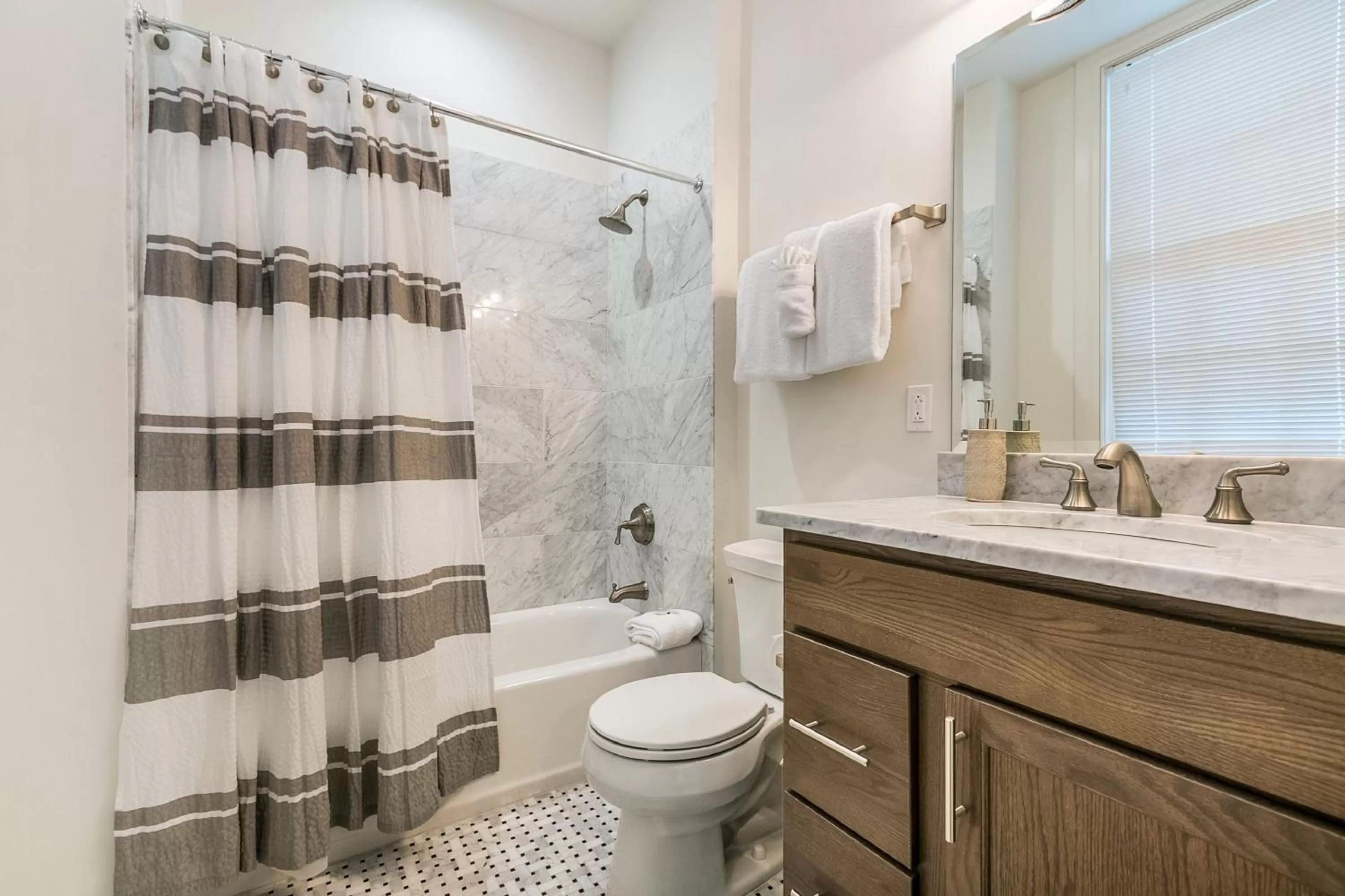 Bathroom in 1 and 2 BR Private Condos Steps Away From French Quarter