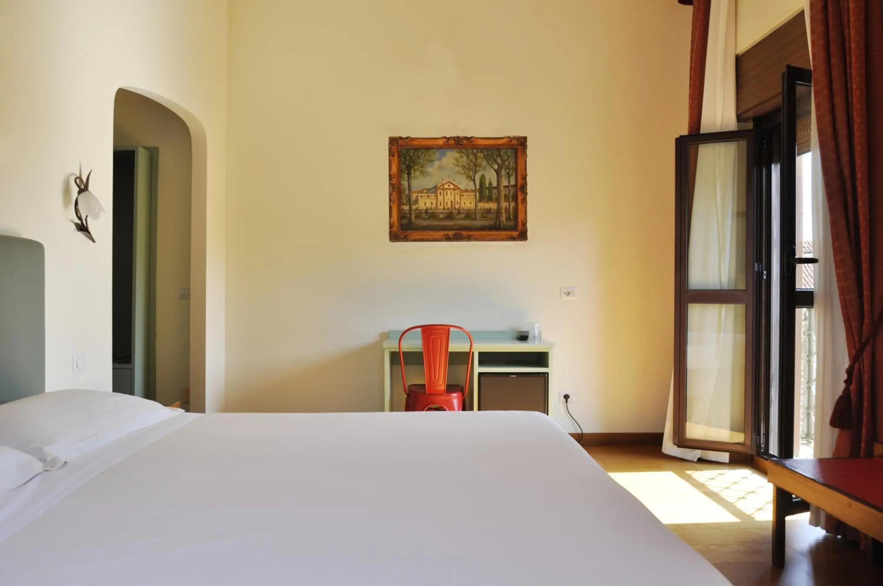 Bed in Hotel San Guido