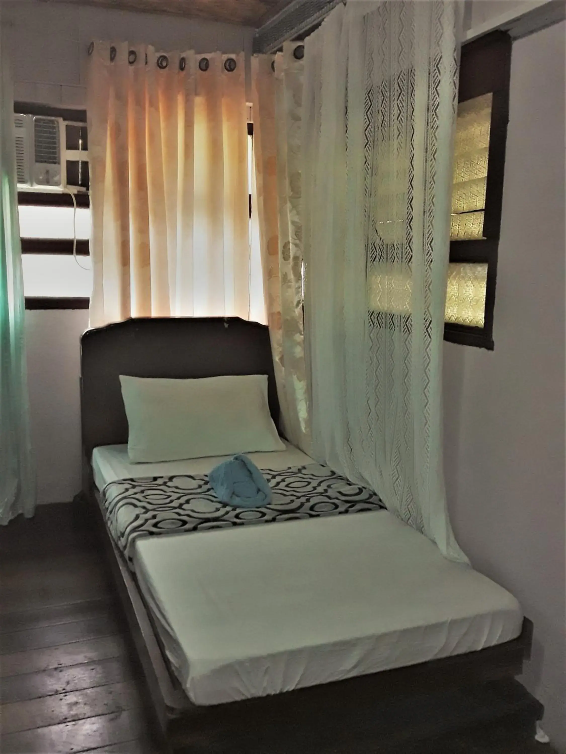 Bed in Oasis Balili Heritage Lodge