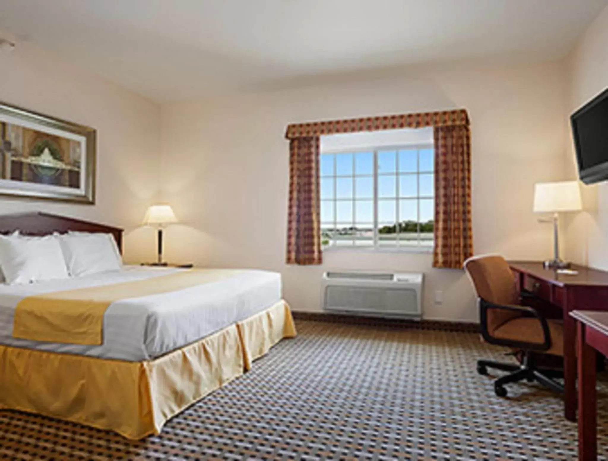 Bed in Days Inn & Suites by Wyndham Columbus NE