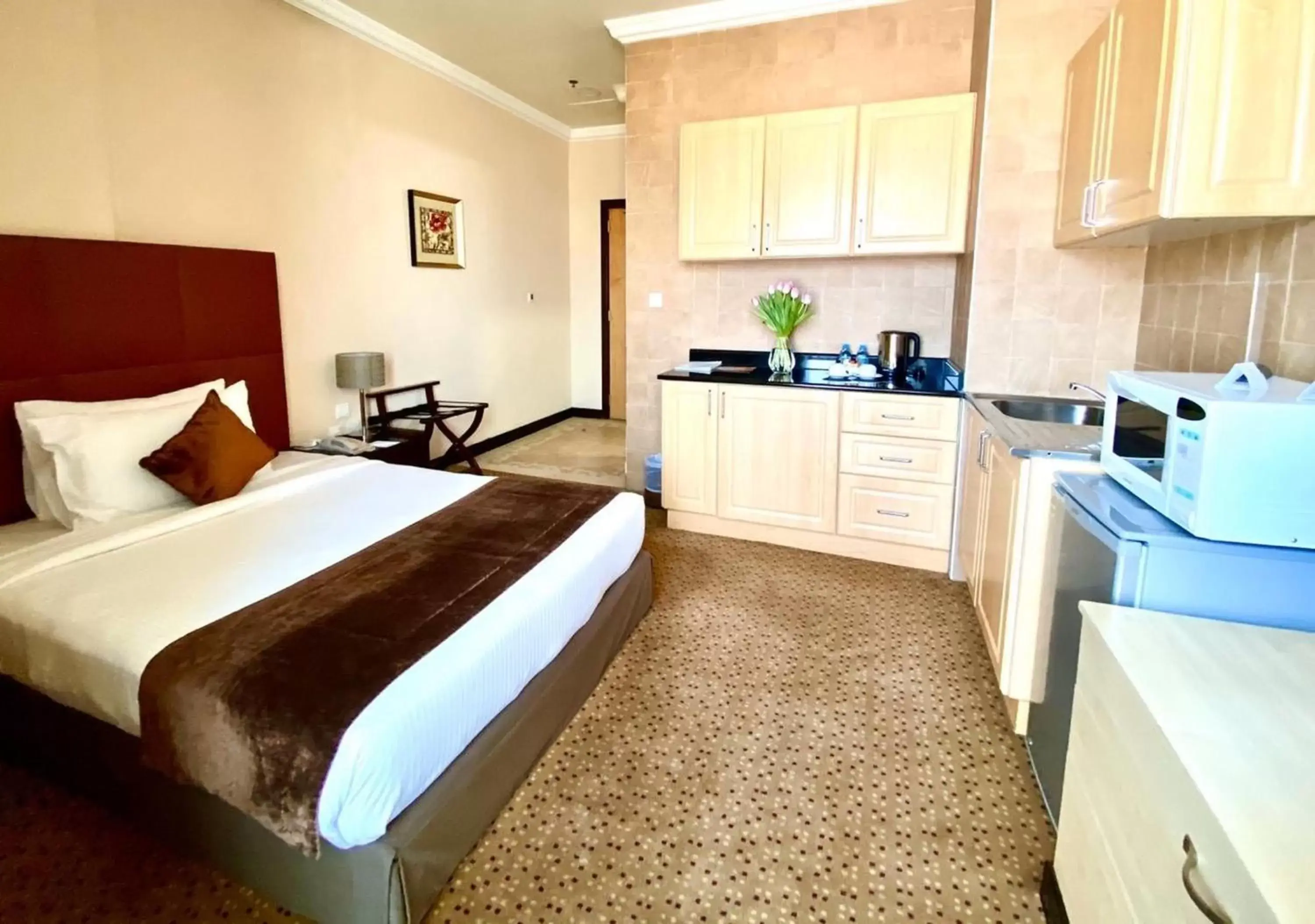 Kitchen or kitchenette, Kitchen/Kitchenette in Kingsgate Hotel Doha by Millennium Hotels.